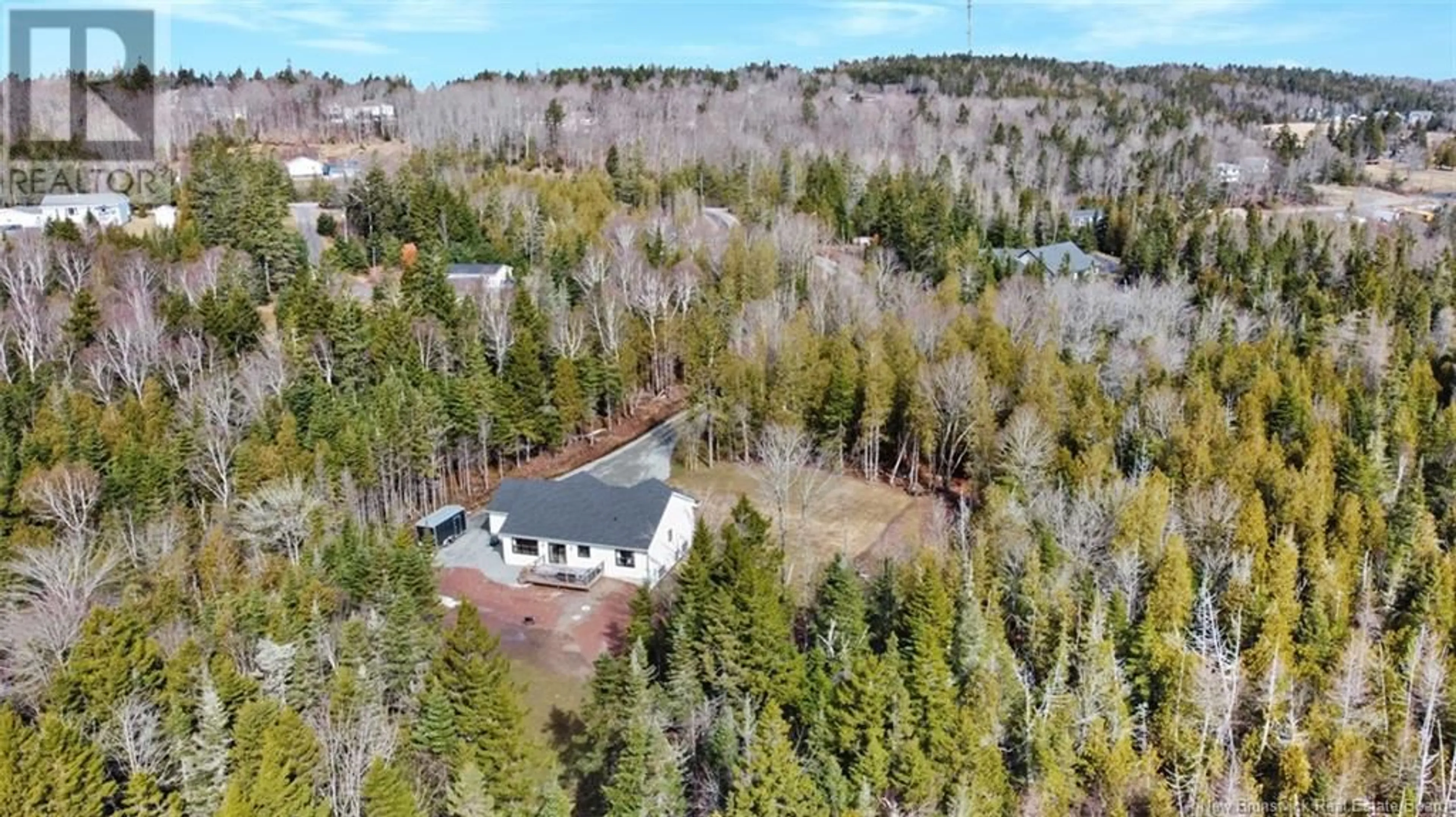 A pic from outside/outdoor area/front of a property/back of a property/a pic from drone, forest/trees view for 50 CHAMBERLAIN ROAD, Quispamsis New Brunswick E2G1C1