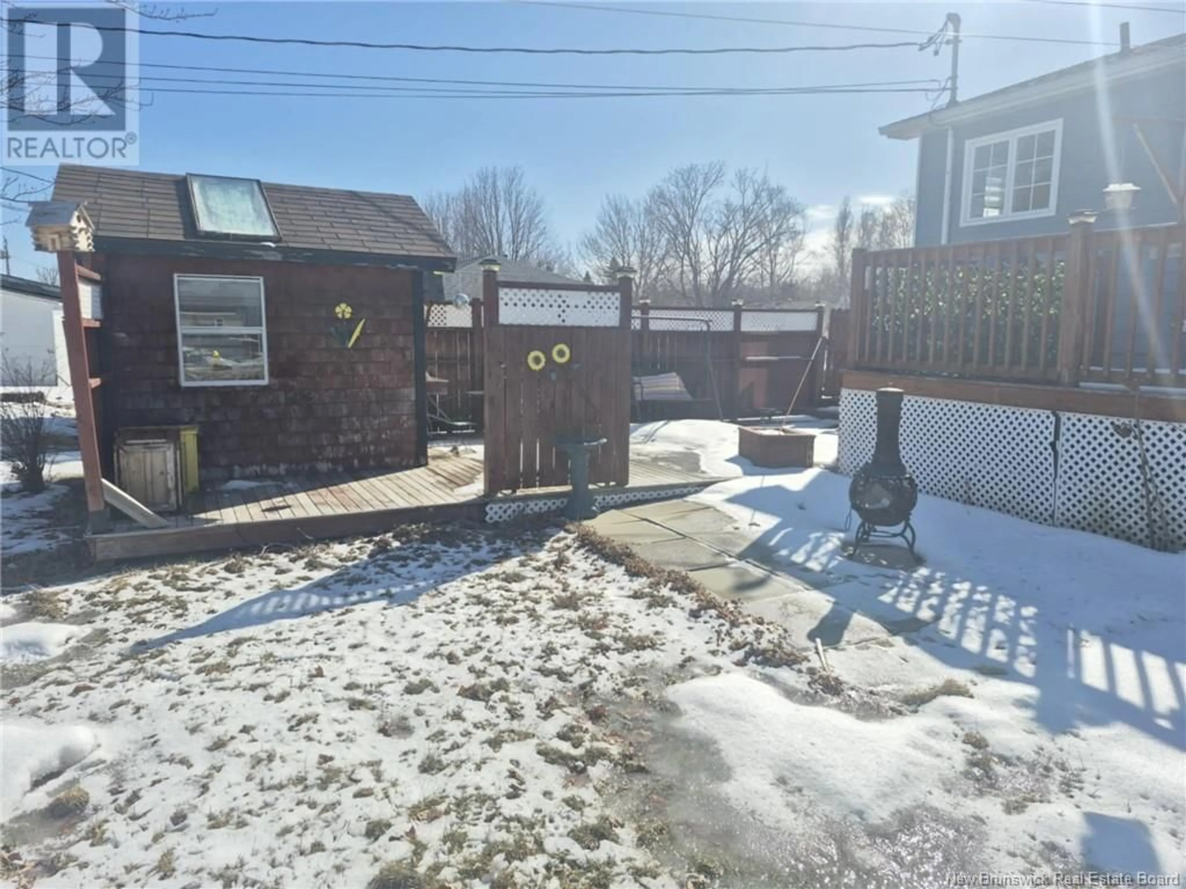 A pic from outside/outdoor area/front of a property/back of a property/a pic from drone, street for 210 RUE FRANCINE, Beresford New Brunswick E8K1N8