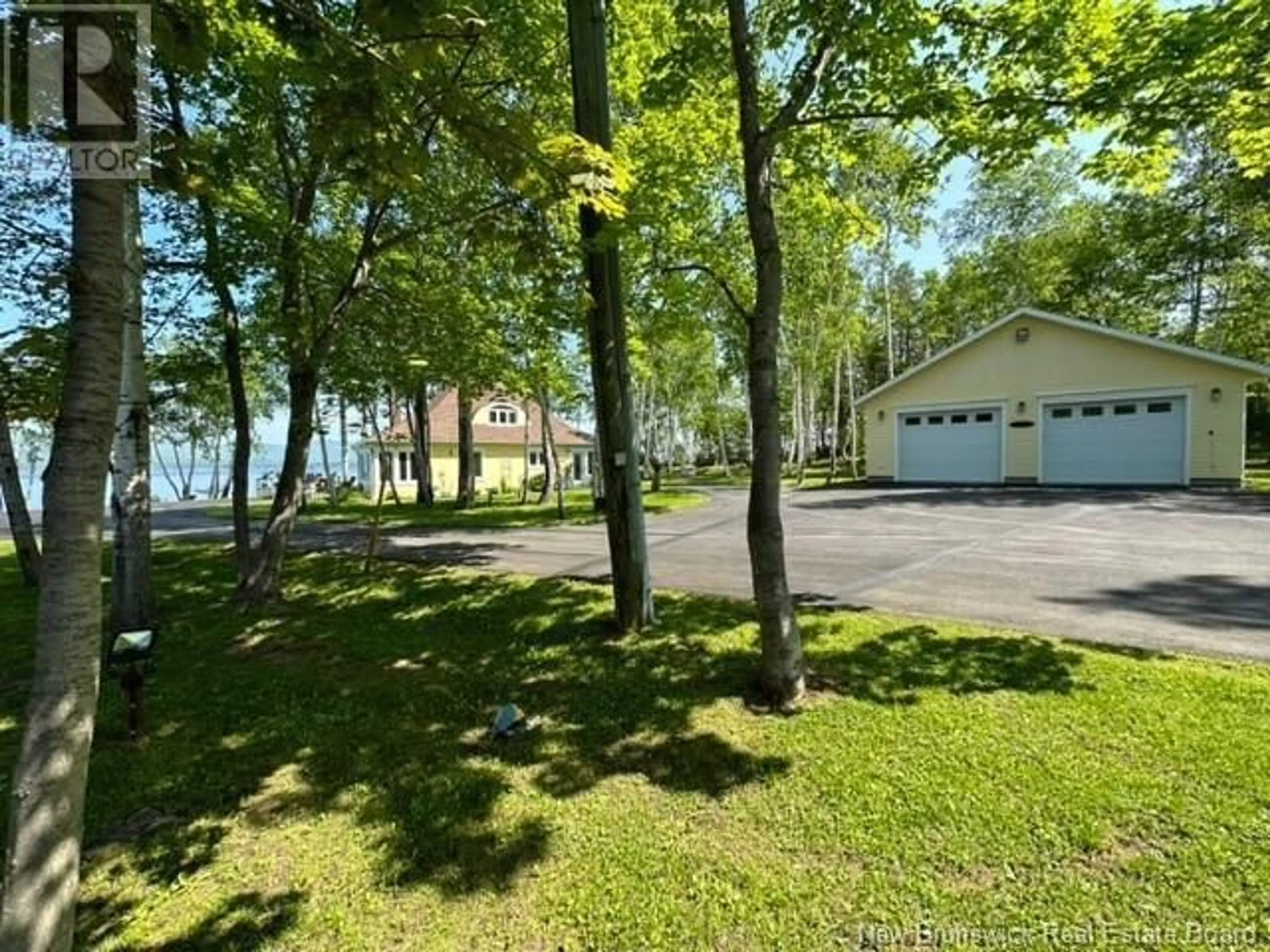 A pic from outside/outdoor area/front of a property/back of a property/a pic from drone, water/lake/river/ocean view for 13 TREPANIER, Mcleods New Brunswick E3N0A6