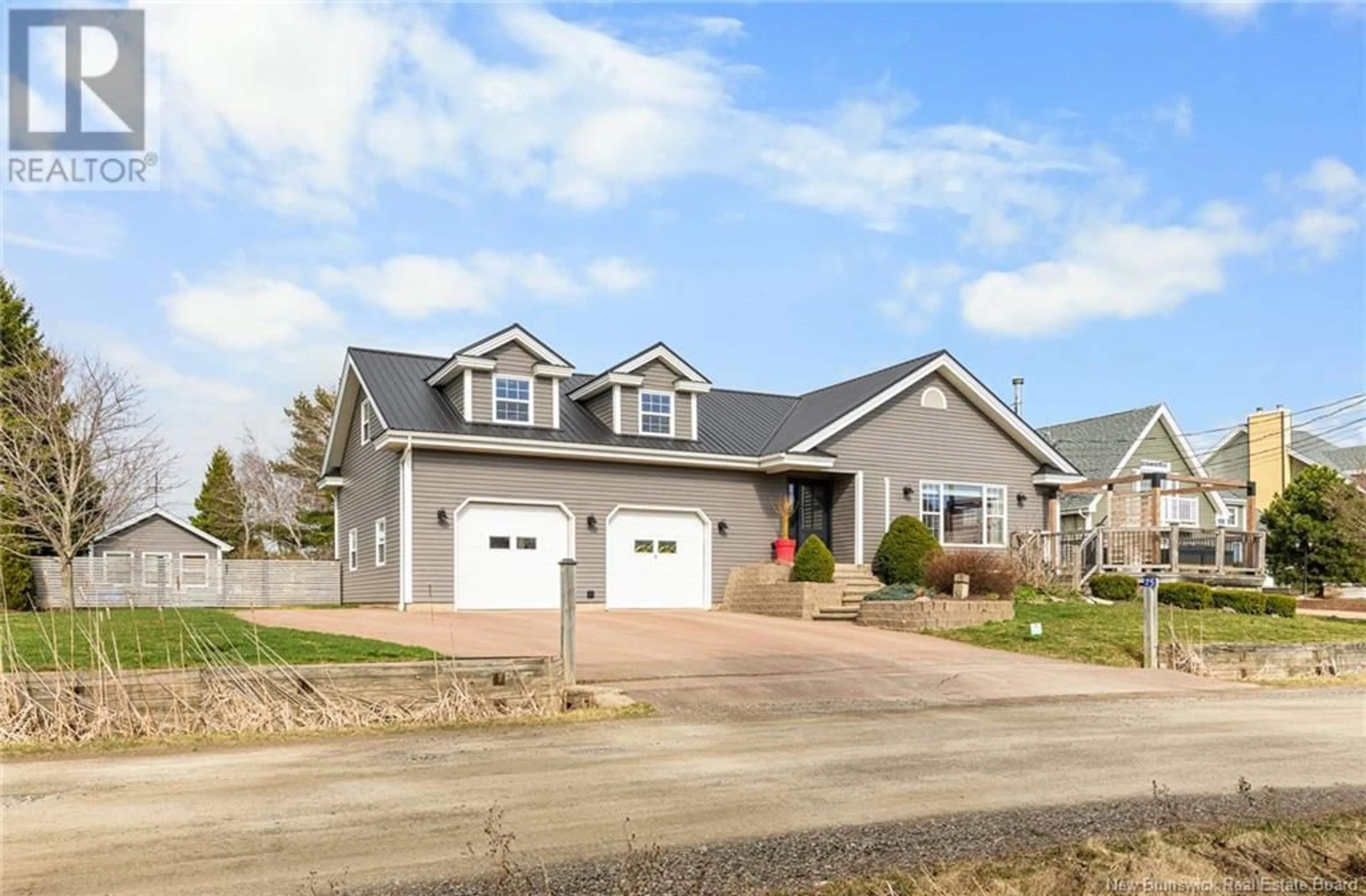 Home with vinyl exterior material, street for 75 LOUIS-A-CHARLES STREET, Grande-Digue New Brunswick E4R4S5