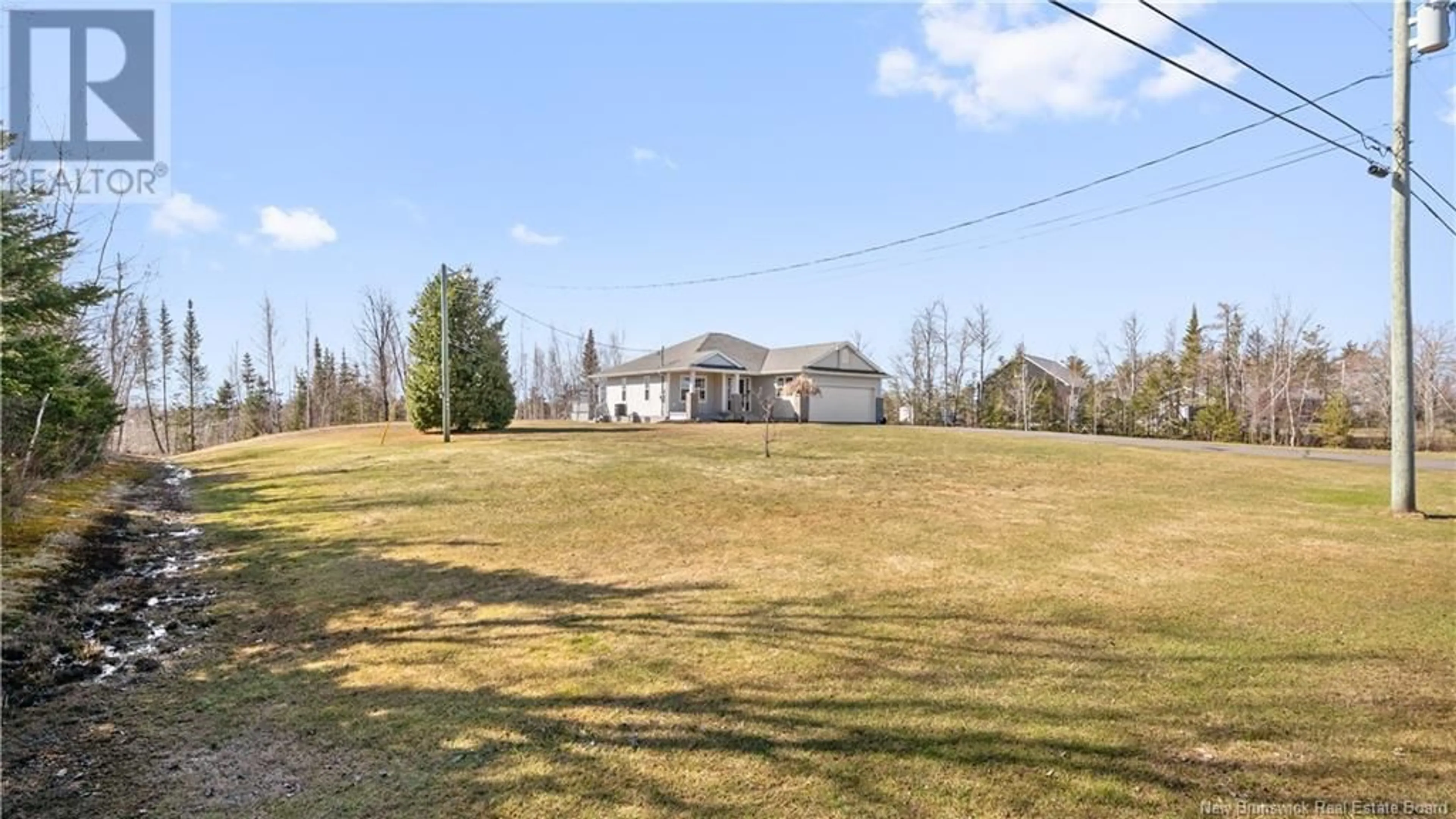 A pic from outside/outdoor area/front of a property/back of a property/a pic from drone, water/lake/river/ocean view for 20 POTTS RD, McIntosh Hill New Brunswick E4S4K7