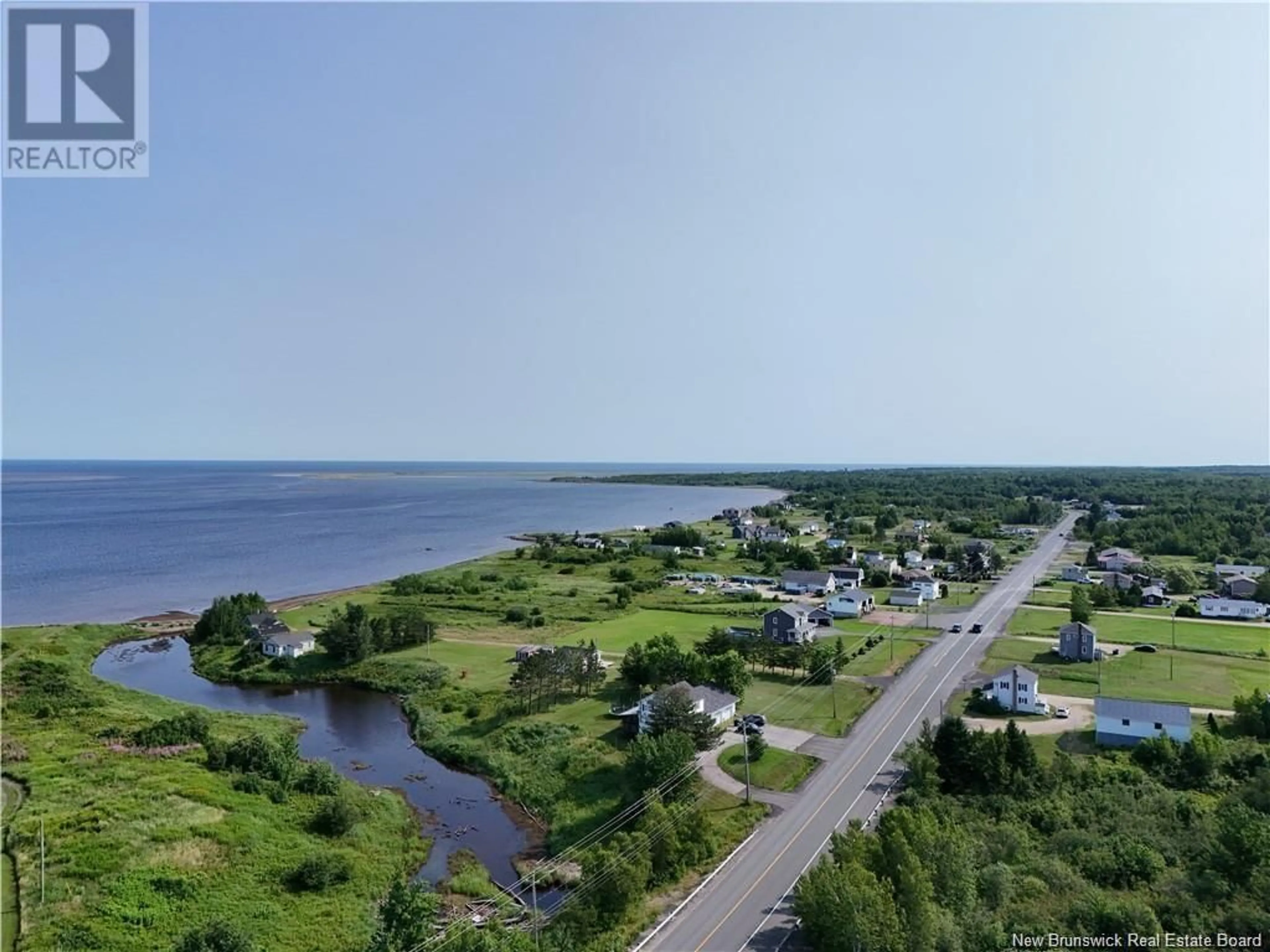 A pic from outside/outdoor area/front of a property/back of a property/a pic from drone, water/lake/river/ocean view for 5323 ROUTE 117, Baie-Sainte-Anne New Brunswick E9A1C9