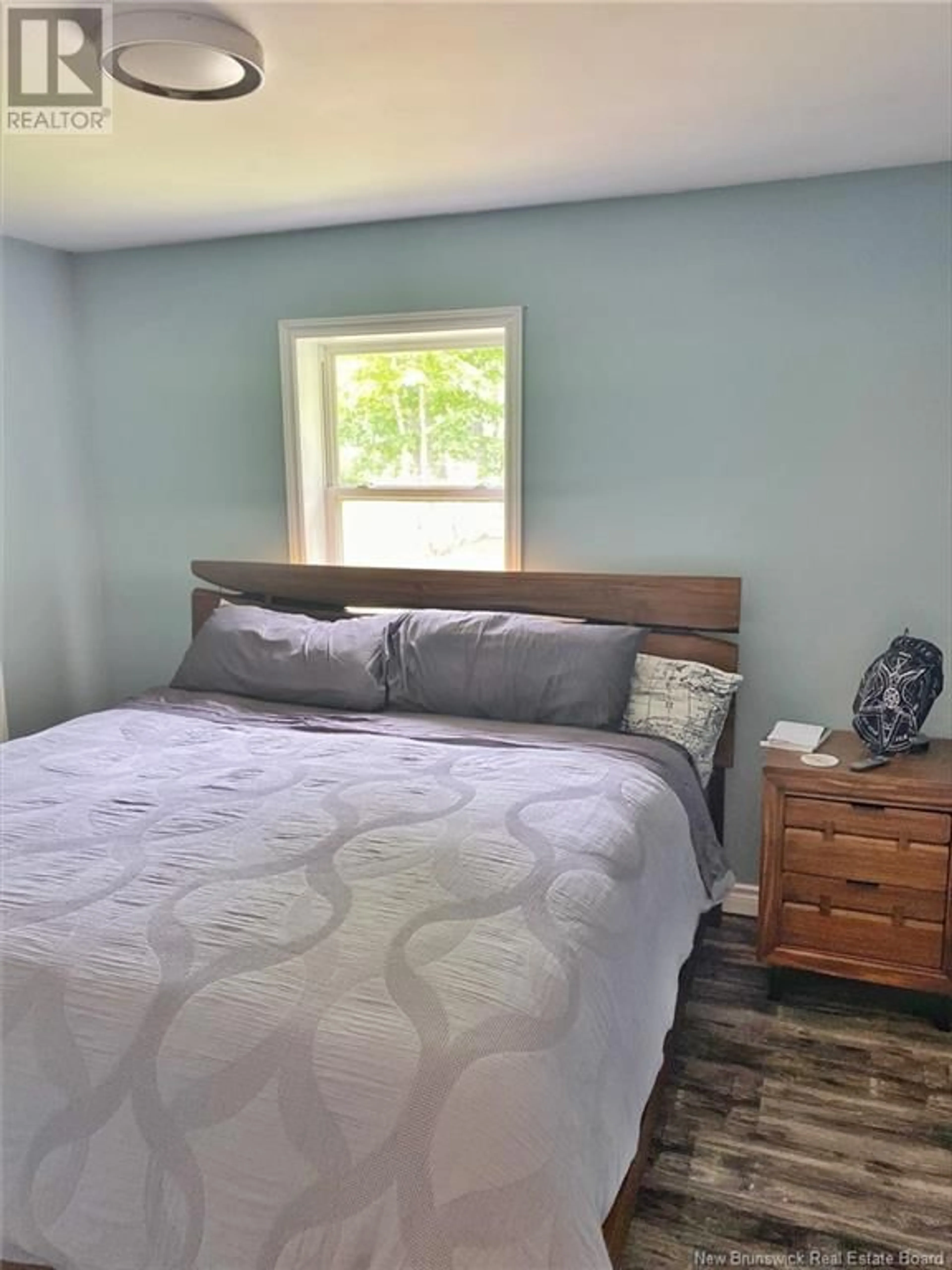 Bedroom with bed, wood/laminate floor for 25 W WILSON ROAD, Parkindale New Brunswick E4J1P4