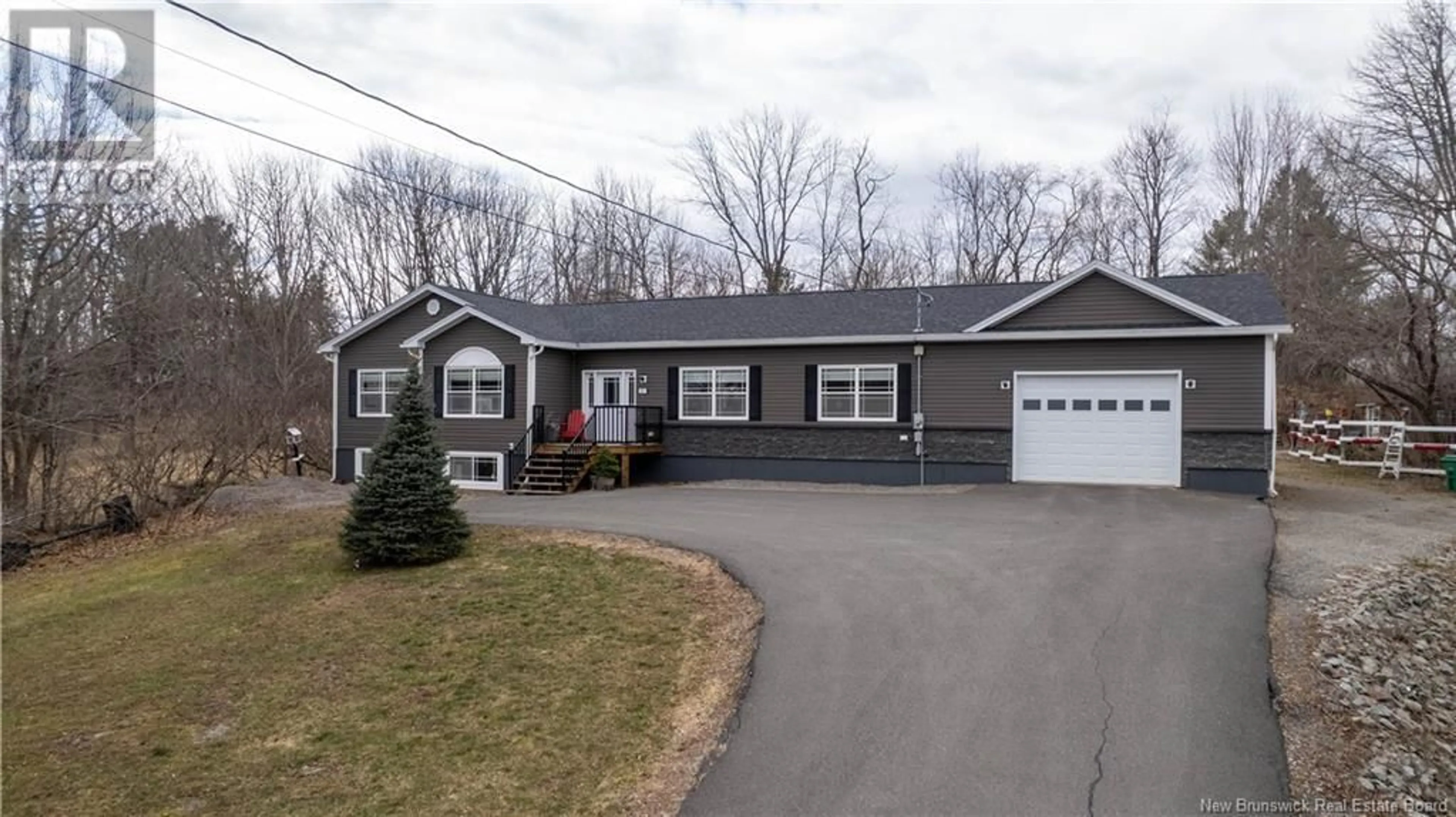 Home with vinyl exterior material, street for 11 QUEENSWAY WAY, St. Stephen New Brunswick E3L1L1
