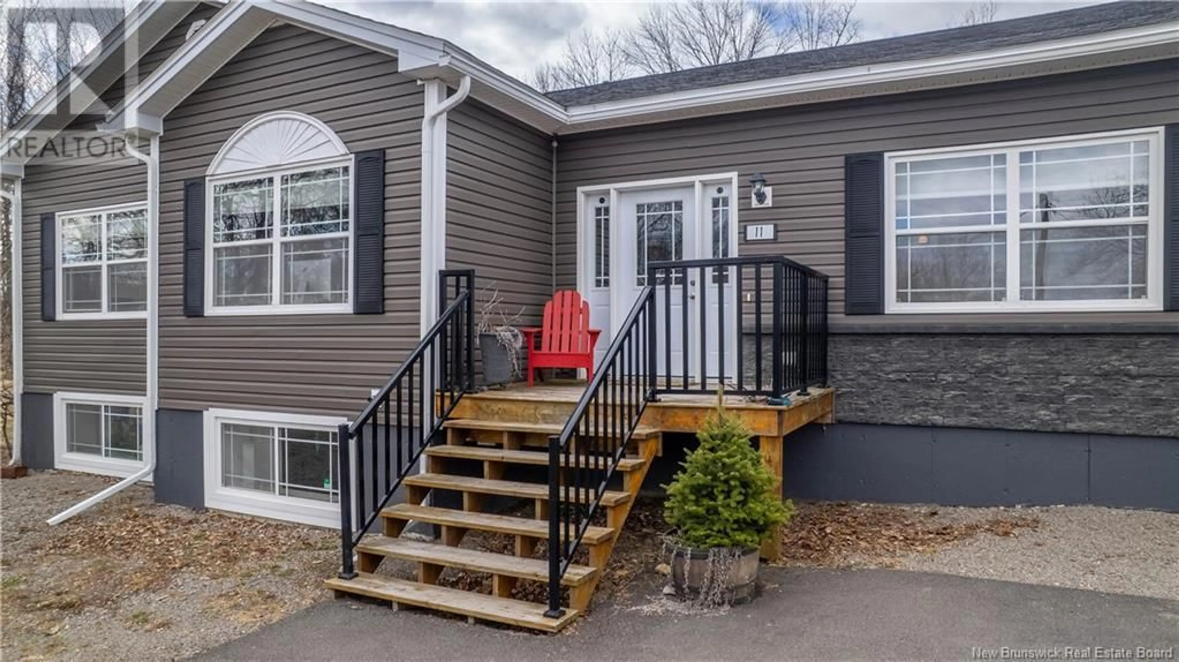 Home with vinyl exterior material, street for 11 QUEENSWAY WAY, St. Stephen New Brunswick E3L1L1