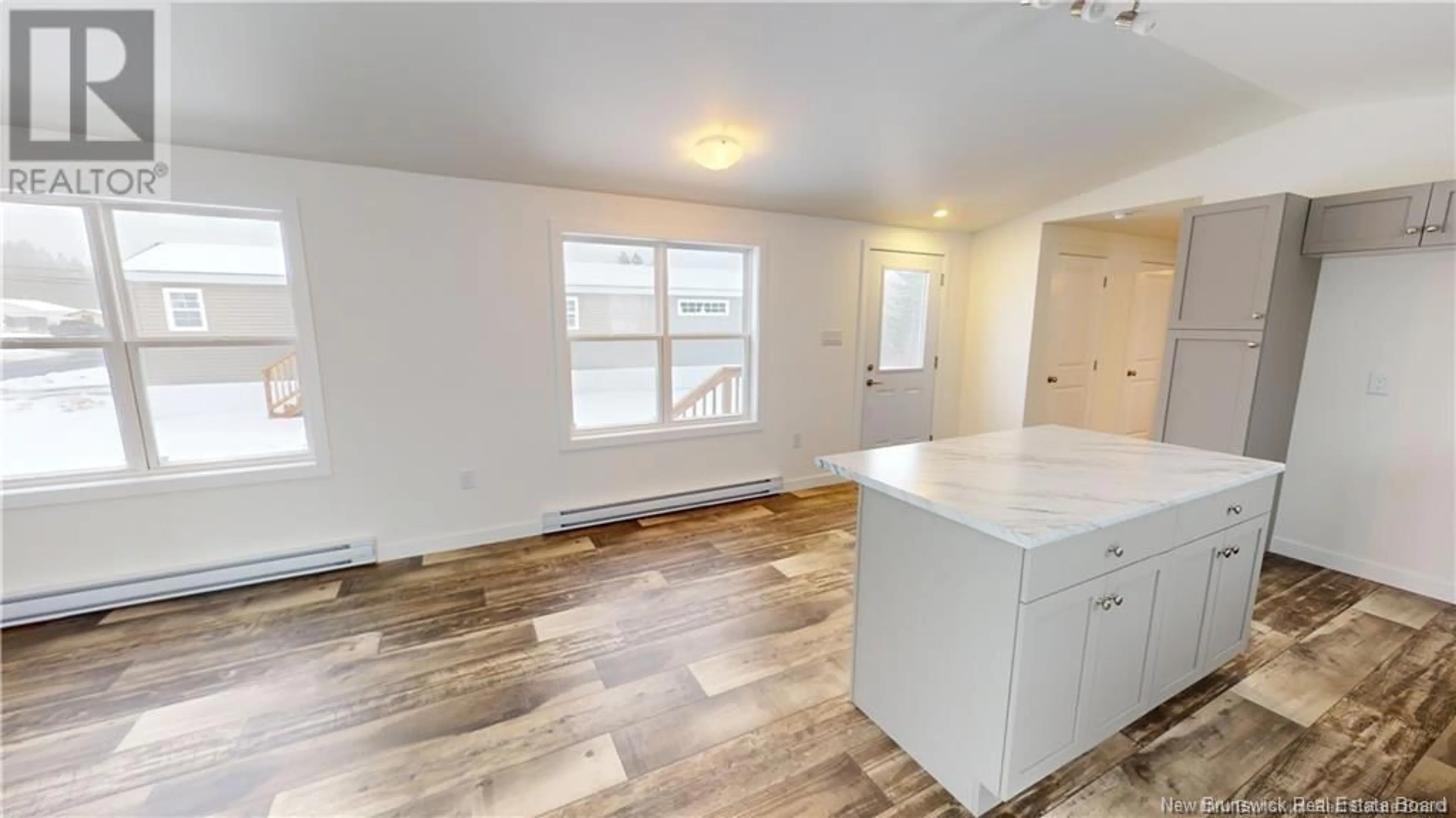 Open concept kitchen, wood/laminate floor for 3 RONALD WOODWORTH ROAD, Tracyville New Brunswick E5L1M7