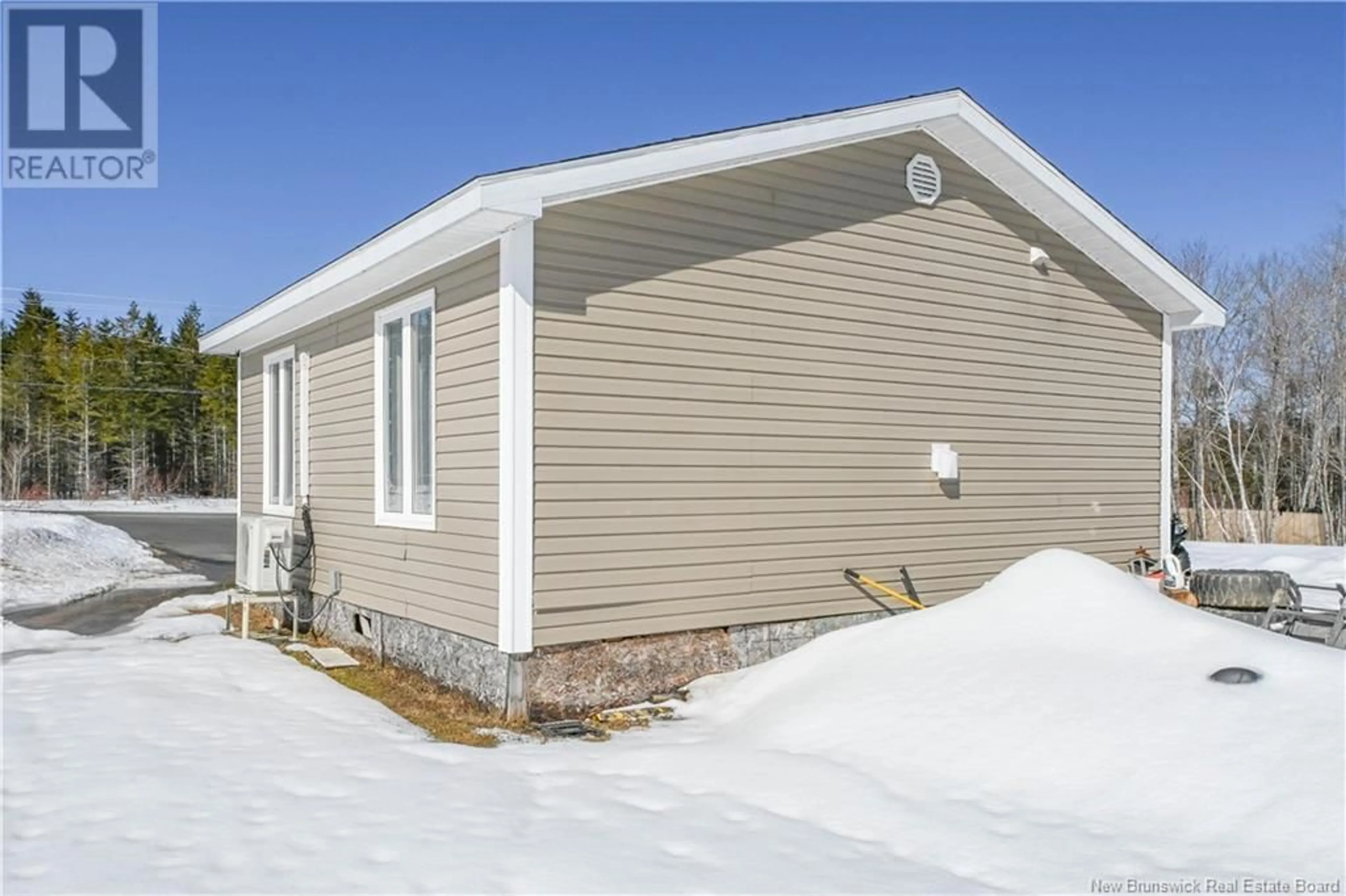 Home with vinyl exterior material, street for 46 PRINCIPALE ROAD, Petit-Paquetville New Brunswick E8R1G2