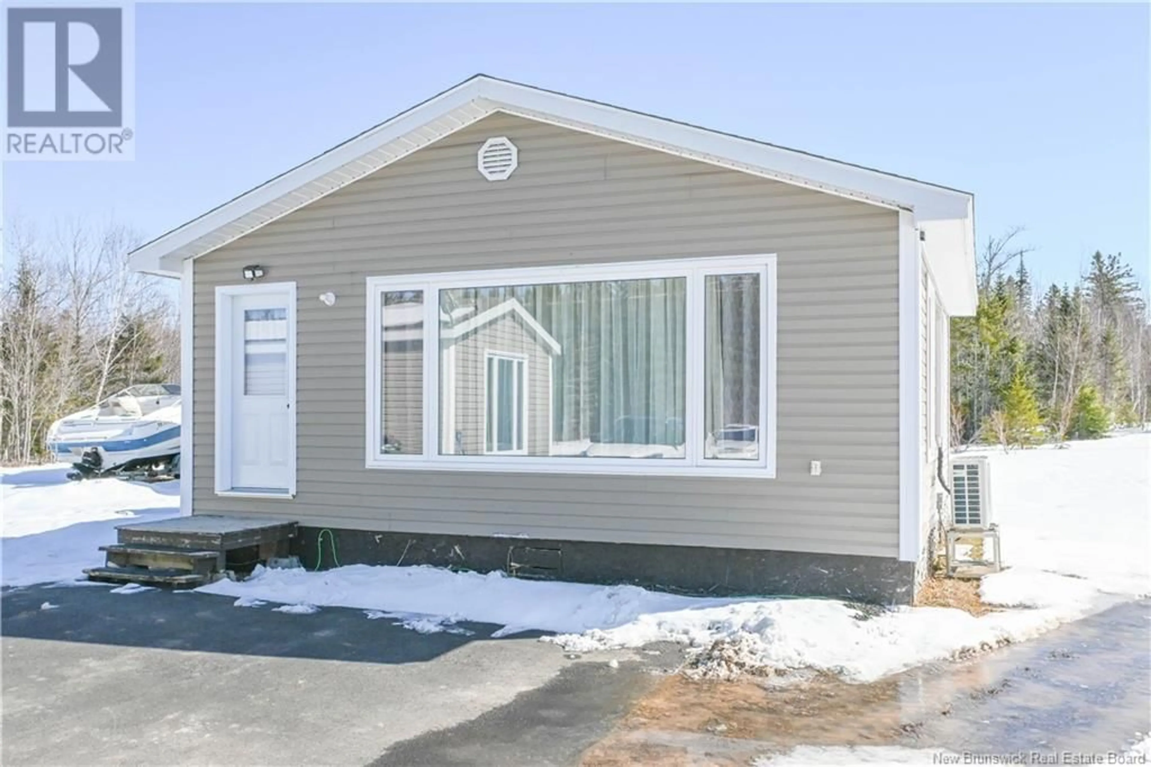 Home with vinyl exterior material, street for 46 PRINCIPALE ROAD, Petit-Paquetville New Brunswick E8R1G2