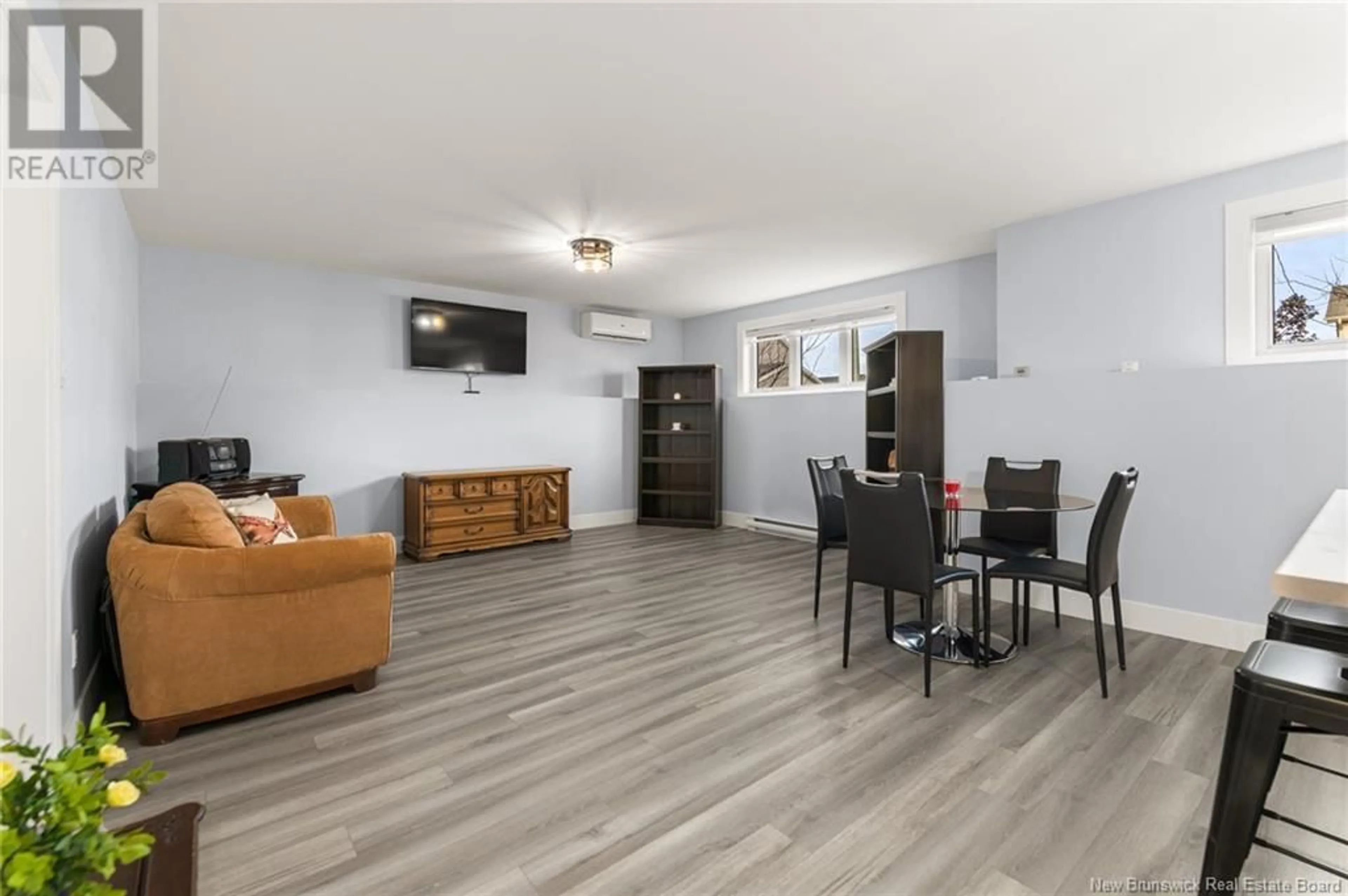 Living room with furniture, wood/laminate floor for 75 SEBASTIEN STREET, Shediac New Brunswick E4P9A5
