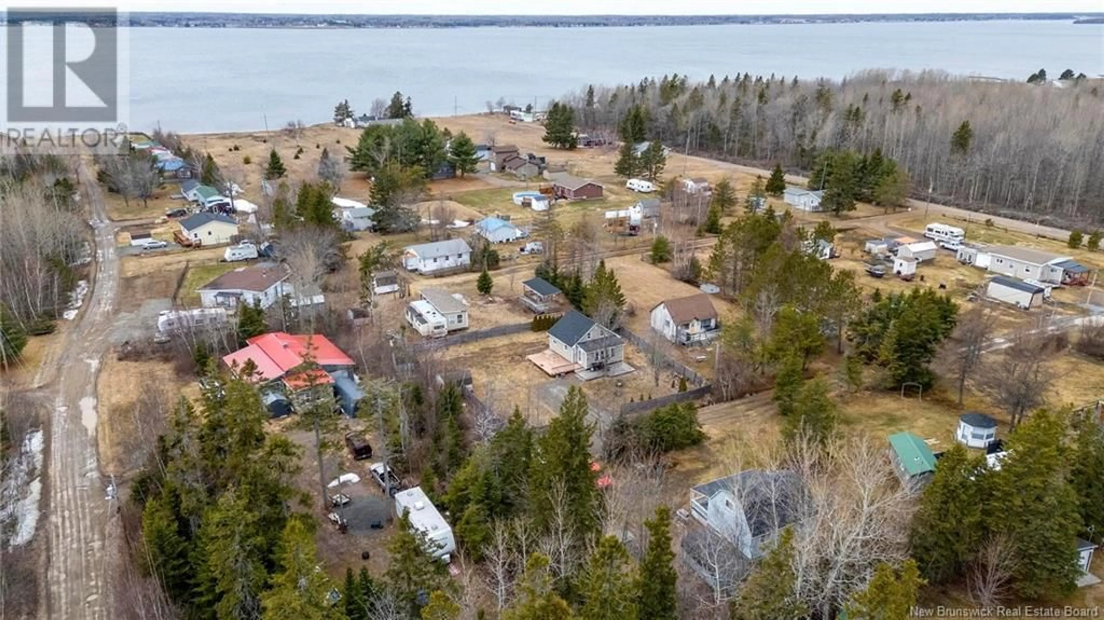 A pic from outside/outdoor area/front of a property/back of a property/a pic from drone, water/lake/river/ocean view for 30 MICHELINE LANE, Grande-Digue New Brunswick E4R4W3