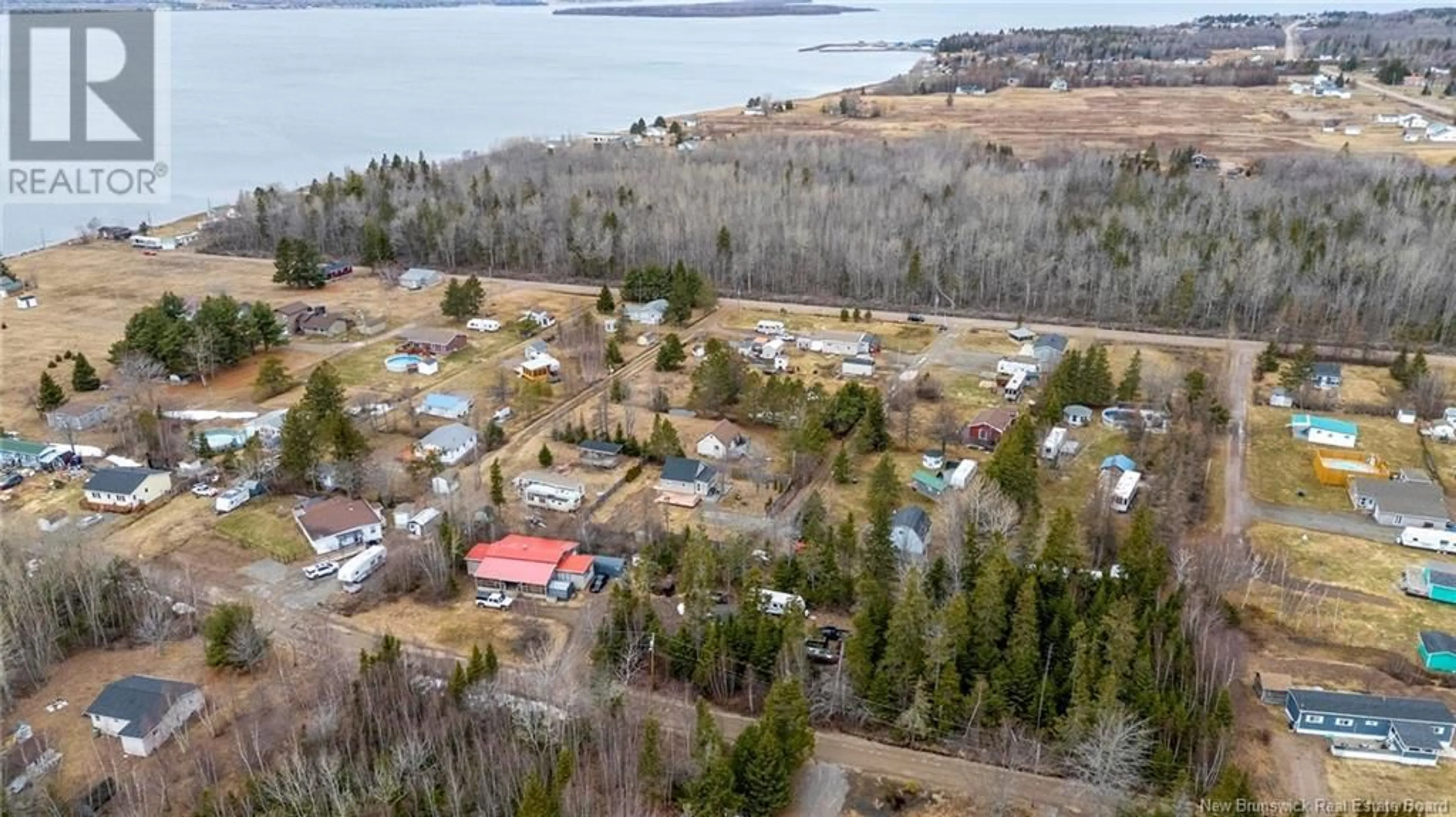 A pic from outside/outdoor area/front of a property/back of a property/a pic from drone, water/lake/river/ocean view for 30 MICHELINE LANE, Grande-Digue New Brunswick E4R4W3