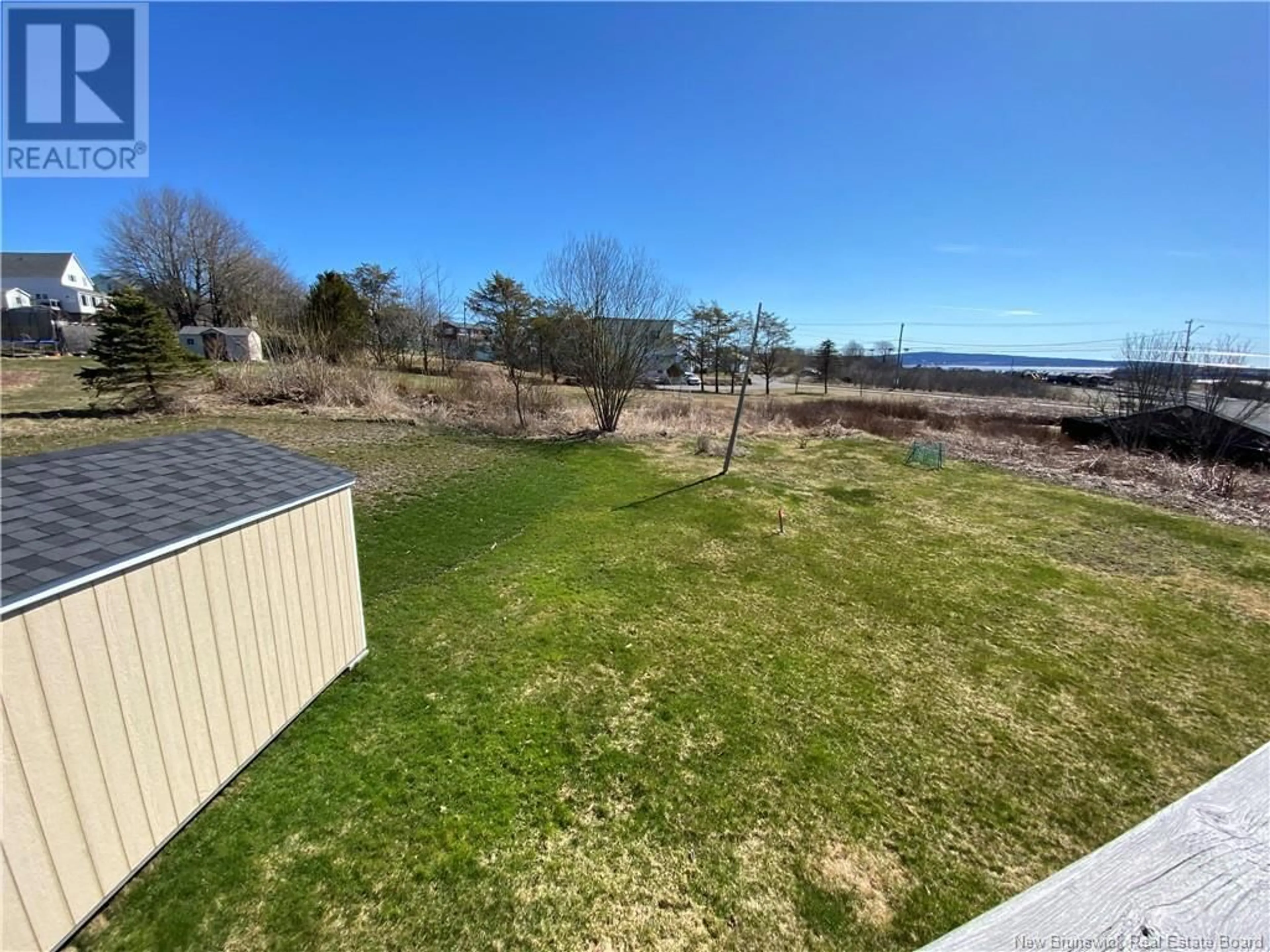 A pic from outside/outdoor area/front of a property/back of a property/a pic from drone, water/lake/river/ocean view for 681 CENTRE STREET, Saint John New Brunswick E2M2P7