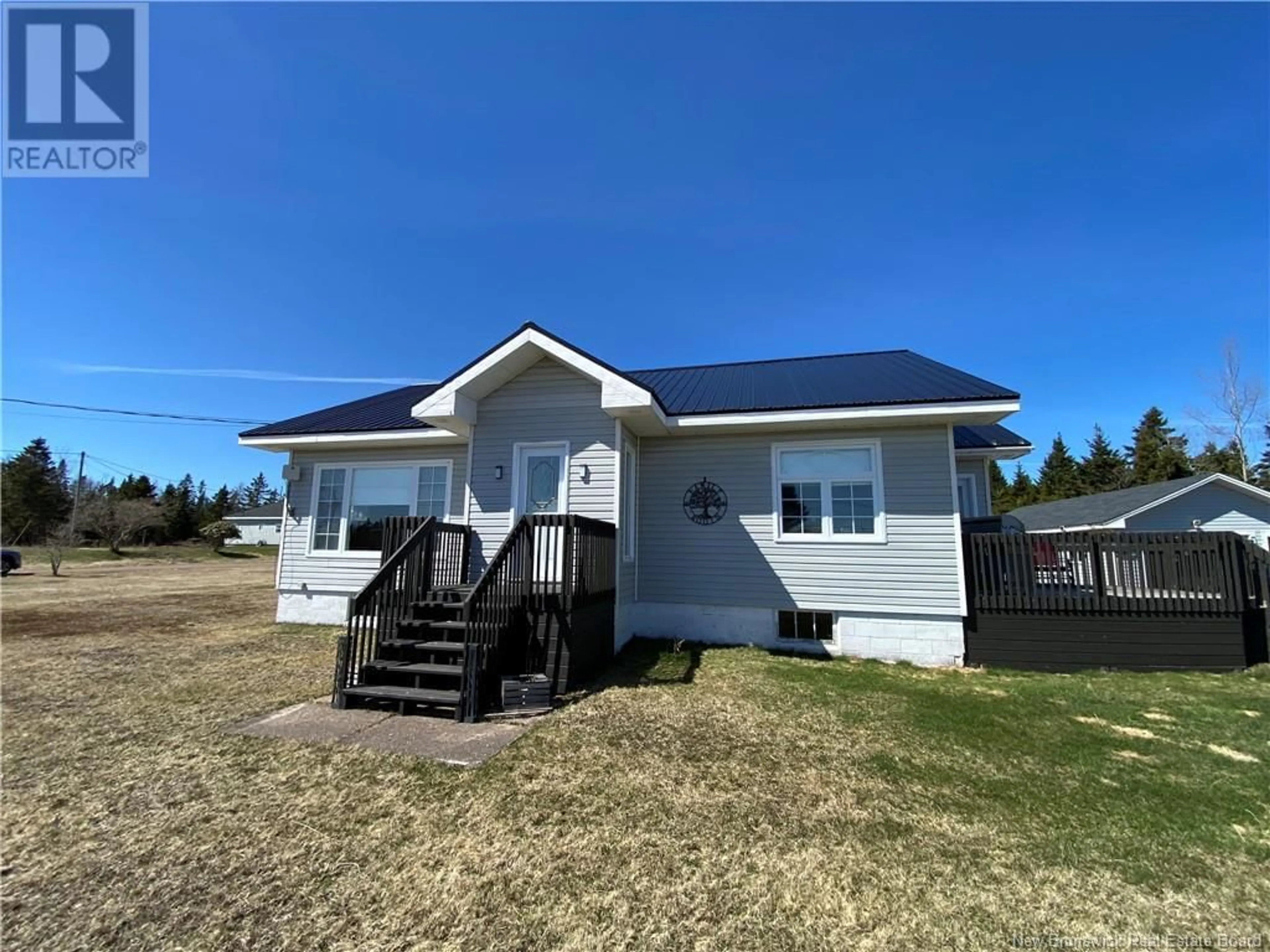 A pic from outside/outdoor area/front of a property/back of a property/a pic from drone, building for 439 MACES BAY RD, Maces Bay New Brunswick E5J1T3