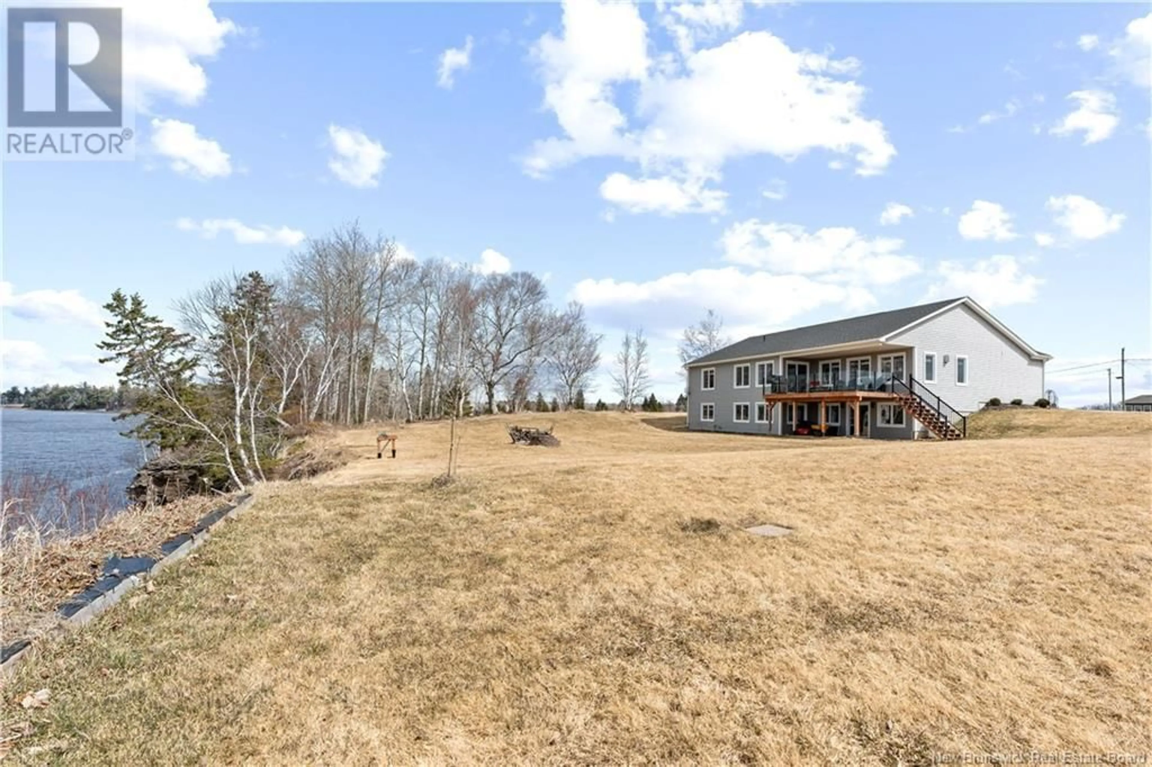 A pic from outside/outdoor area/front of a property/back of a property/a pic from drone, unknown for 21 BEAR CREAK LANE, Main River New Brunswick E4T0C3