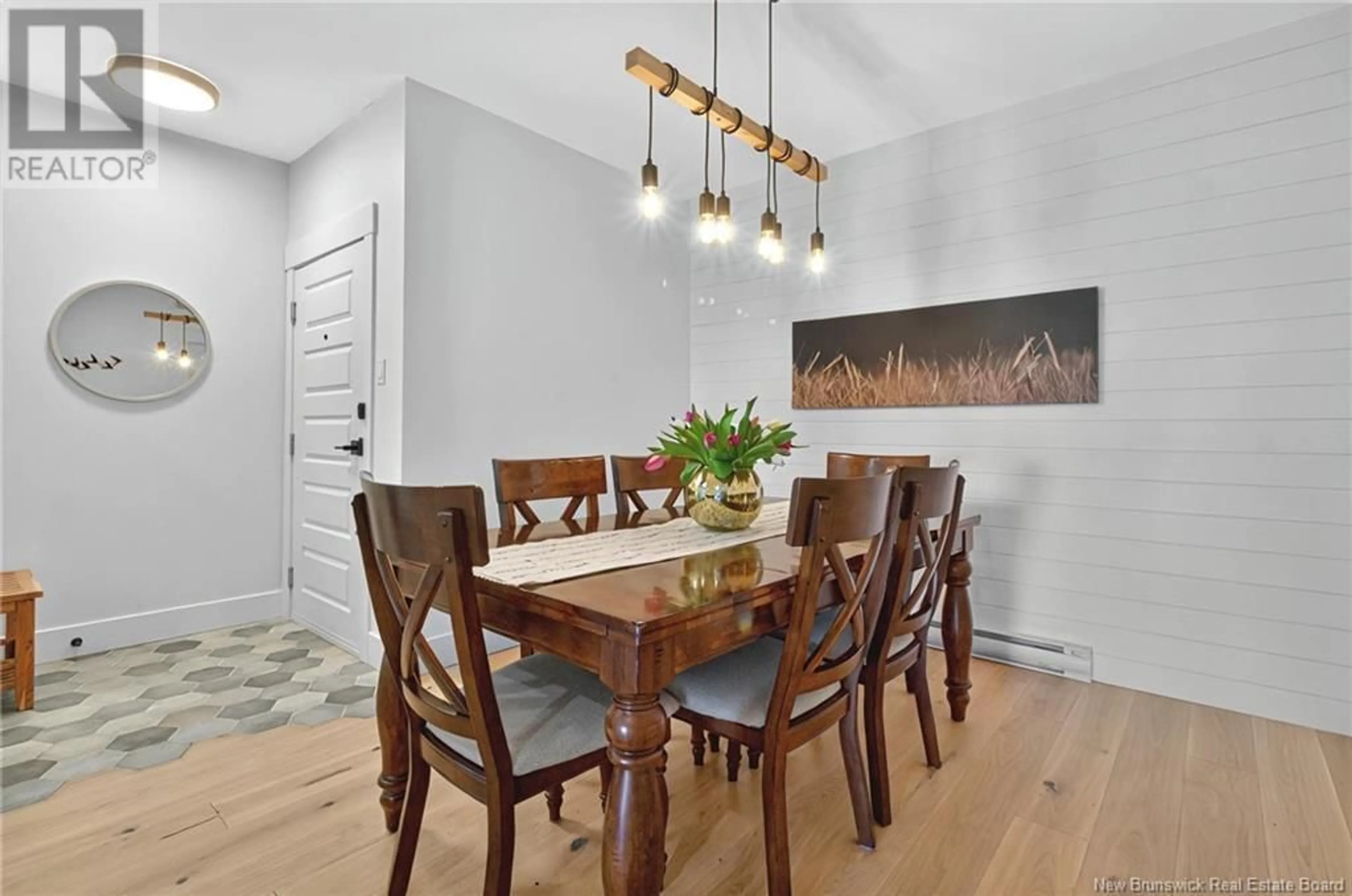 Dining room, wood/laminate floor for 101 - 63 CAP BIMET, Grand-Barachois New Brunswick E4P6X5