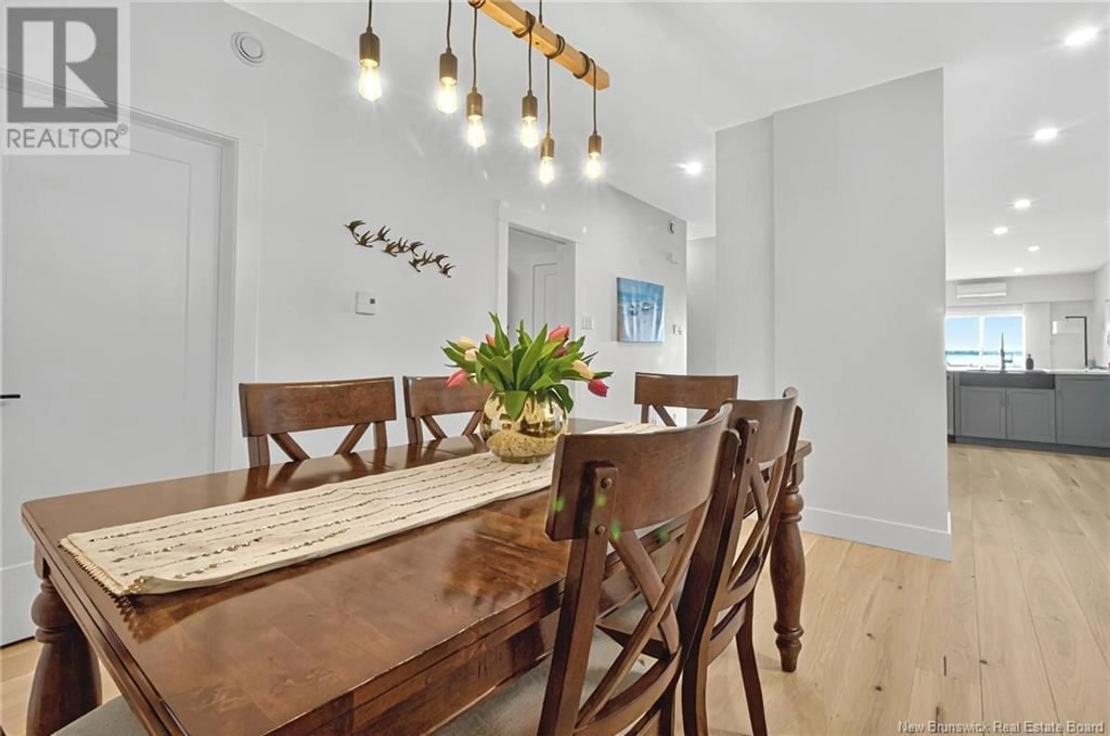 Dining room, wood/laminate floor for 101 - 63 CAP BIMET, Grand-Barachois New Brunswick E4P6X5