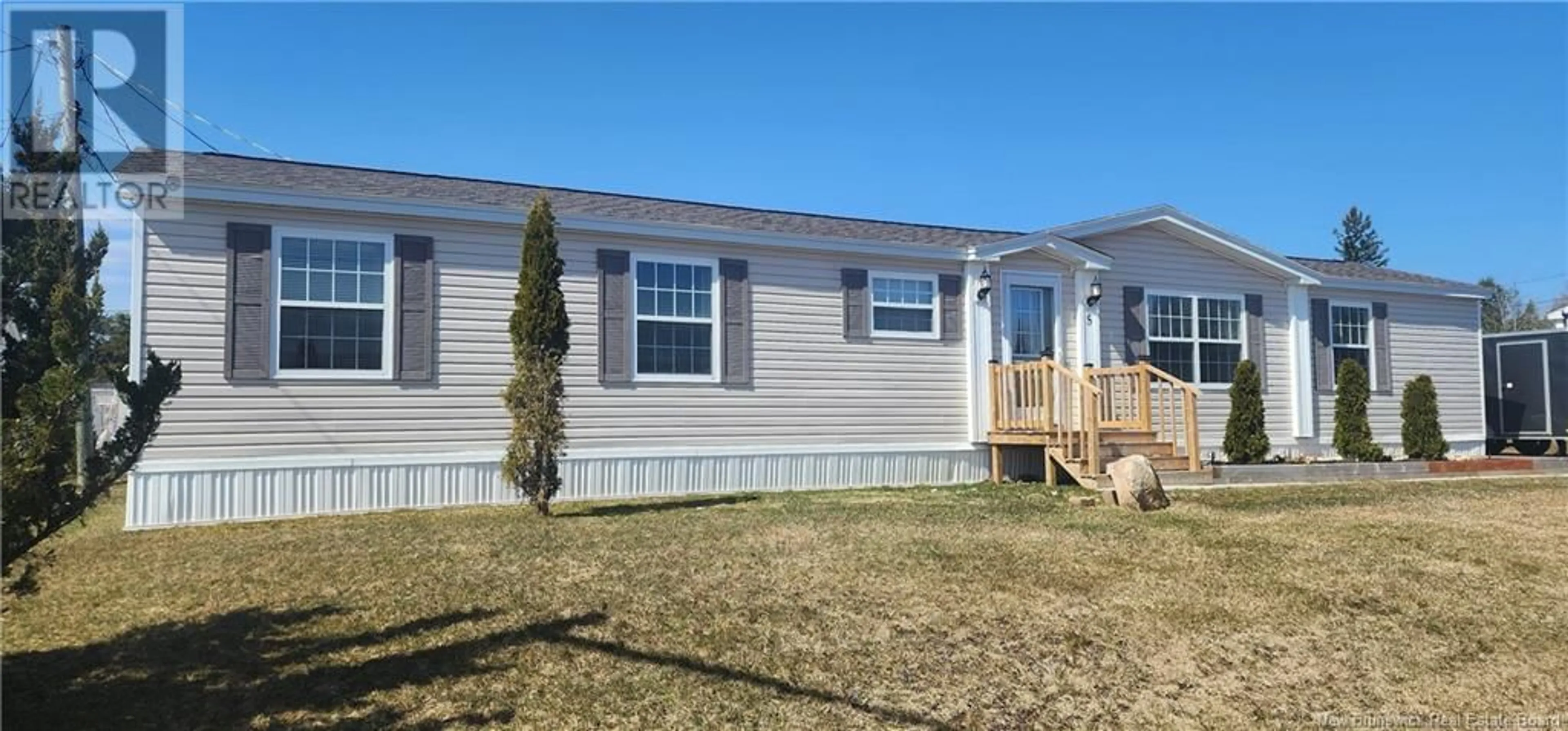 Home with vinyl exterior material, street for 5 BAYBERRY STREET, Moncton New Brunswick E1H3R7
