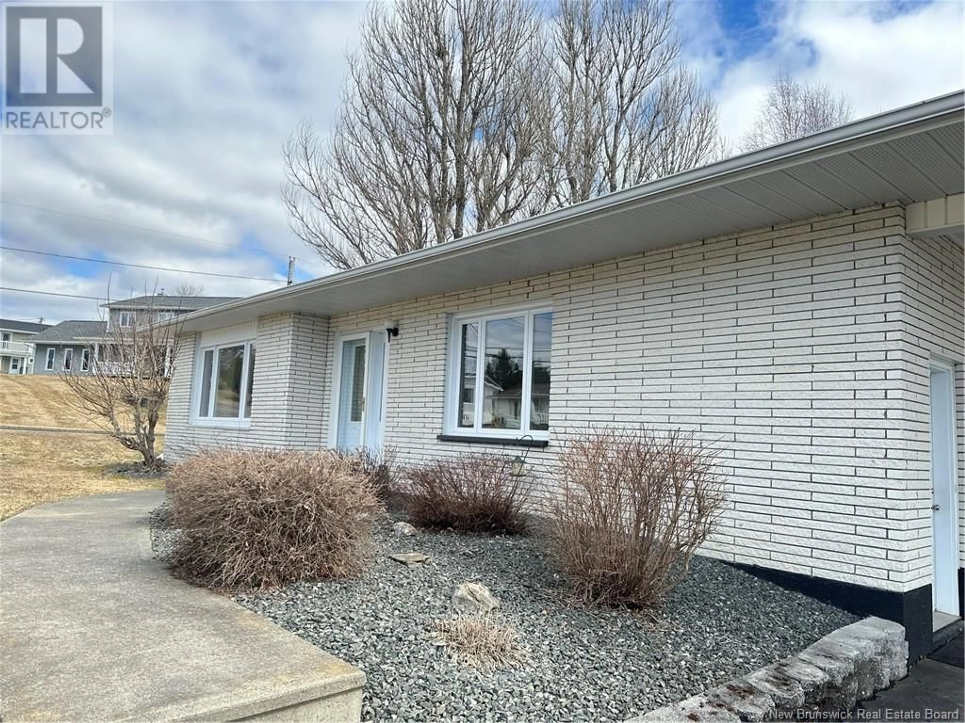Home with vinyl exterior material, street for 200 BEAULIEU STREET, Grand-Sault/Grand Falls New Brunswick E3Y1E3