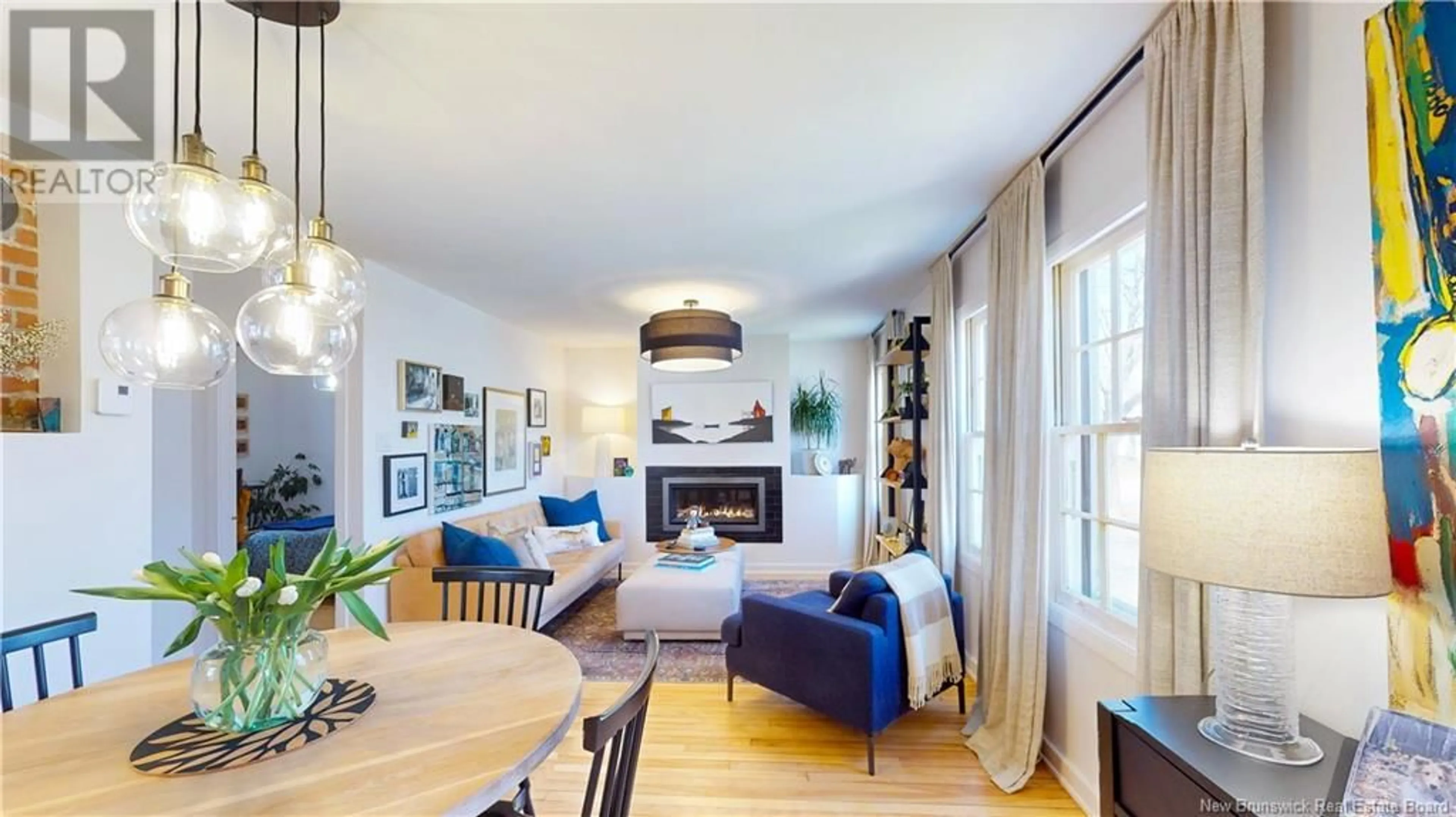 Living room with furniture, wood/laminate floor for 27 PUGSLEY AVENUE, Saint John New Brunswick E2K2X1