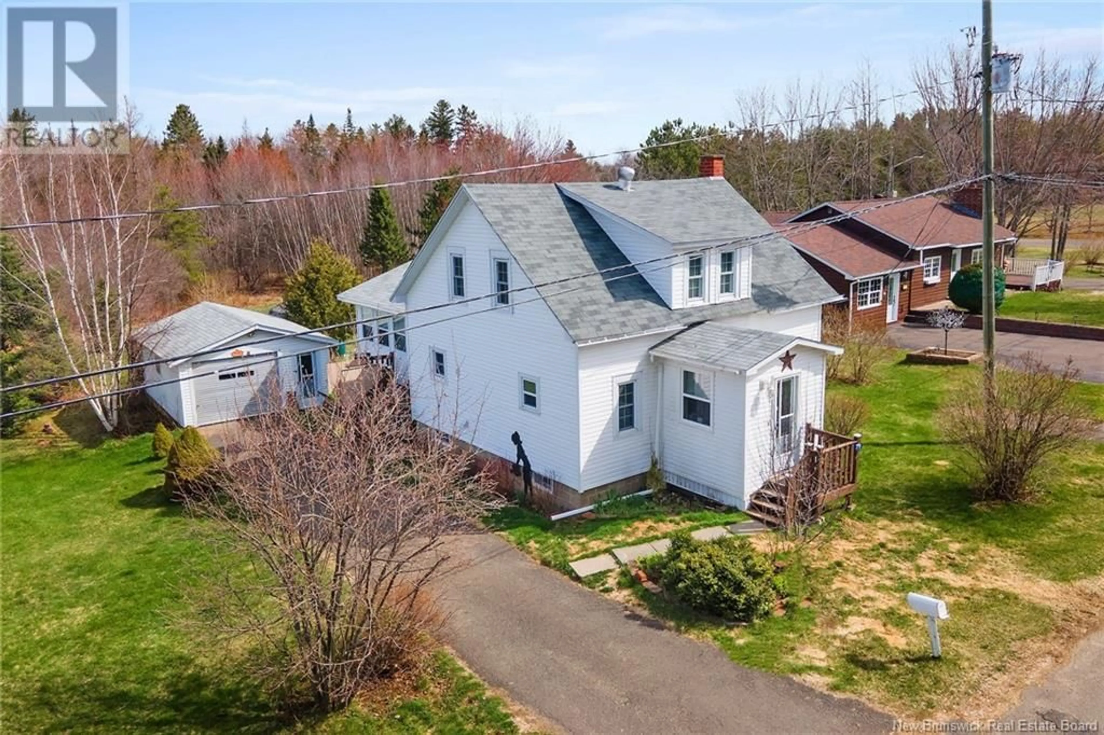 A pic from outside/outdoor area/front of a property/back of a property/a pic from drone, unknown for 79 QUEEN STREET, Chipman New Brunswick E4A2J4