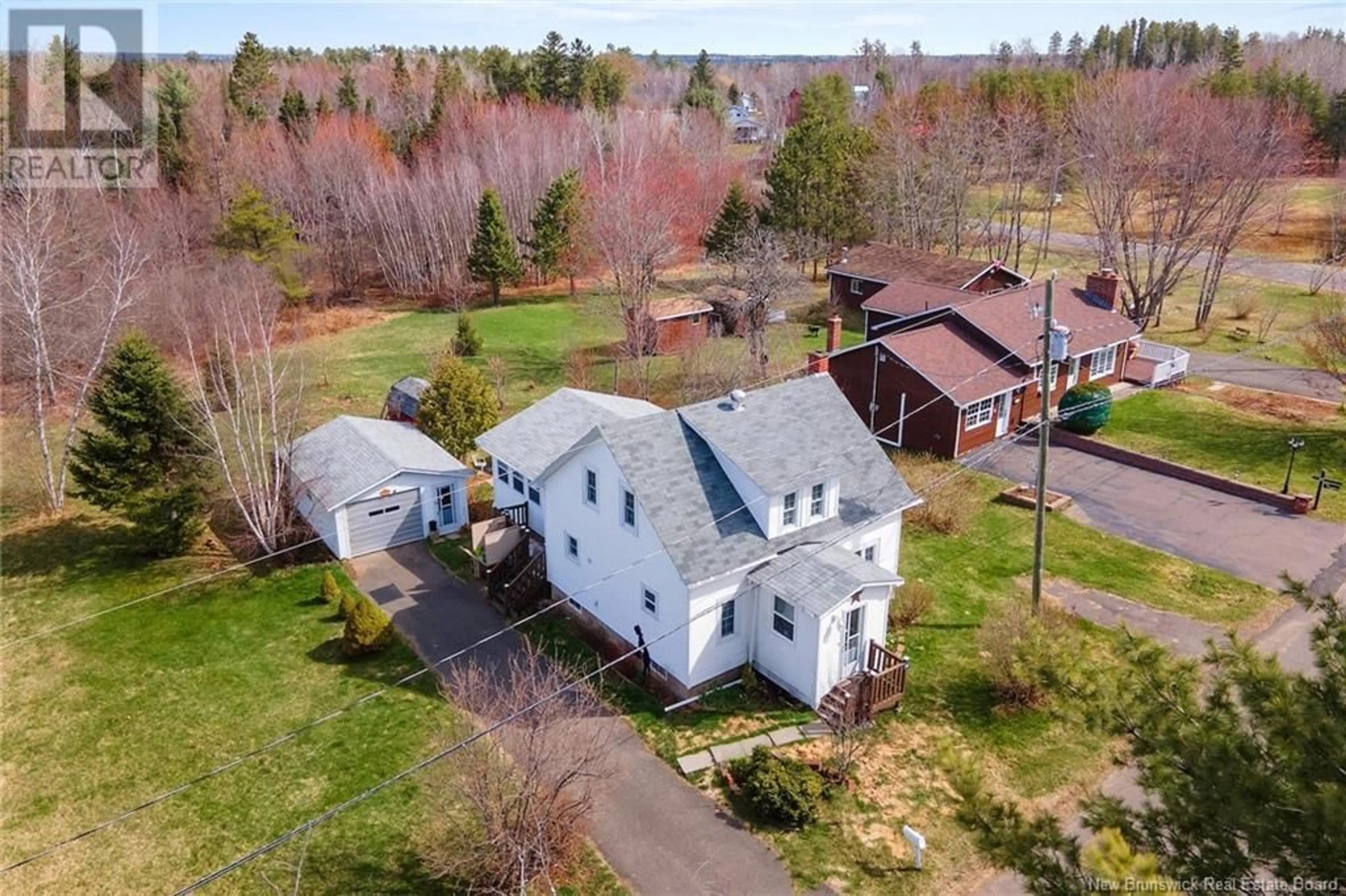 A pic from outside/outdoor area/front of a property/back of a property/a pic from drone, street for 79 QUEEN STREET, Chipman New Brunswick E4A2J4
