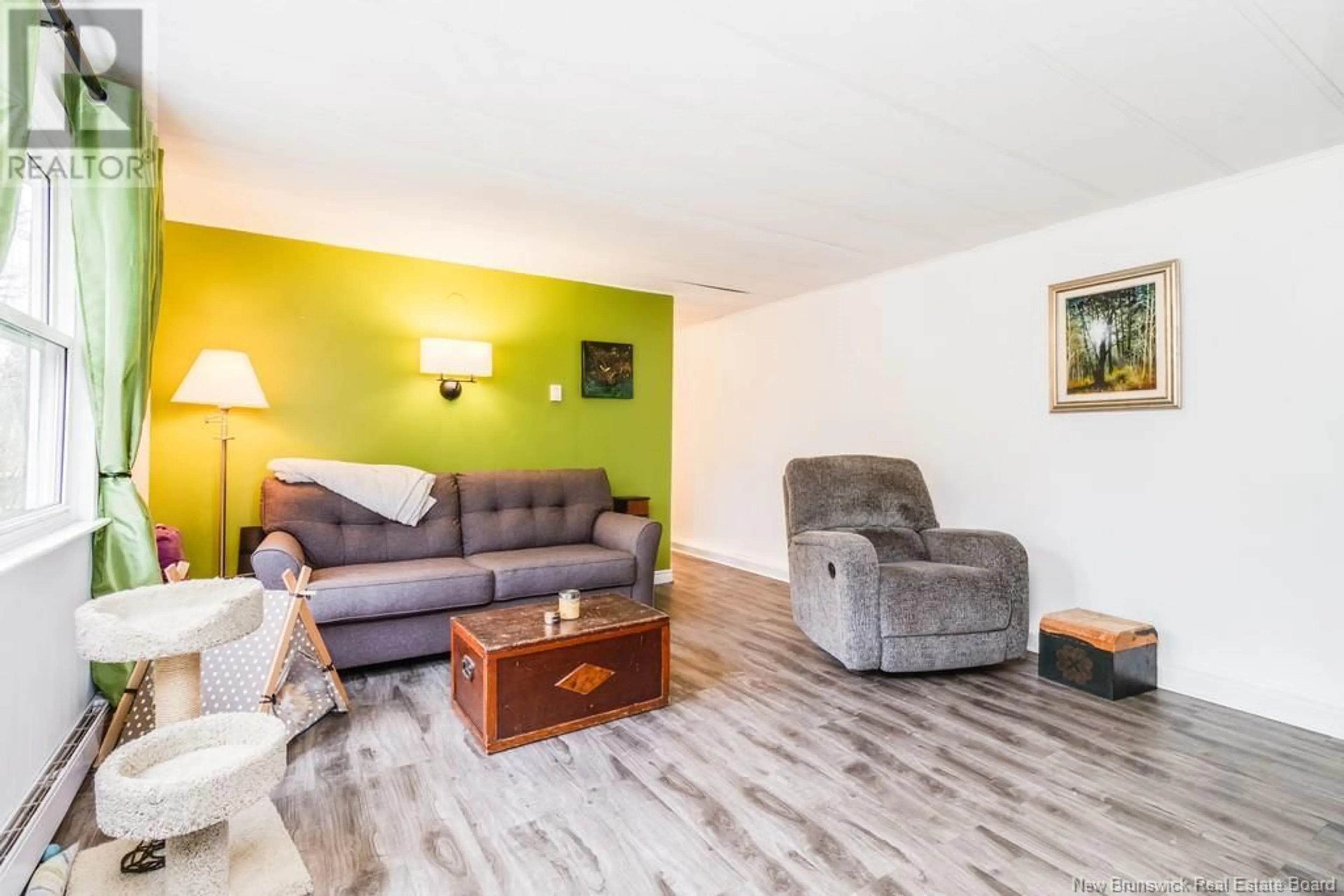 Living room with furniture, wood/laminate floor for 11 HILL STREET, Lincoln New Brunswick E3B6T1