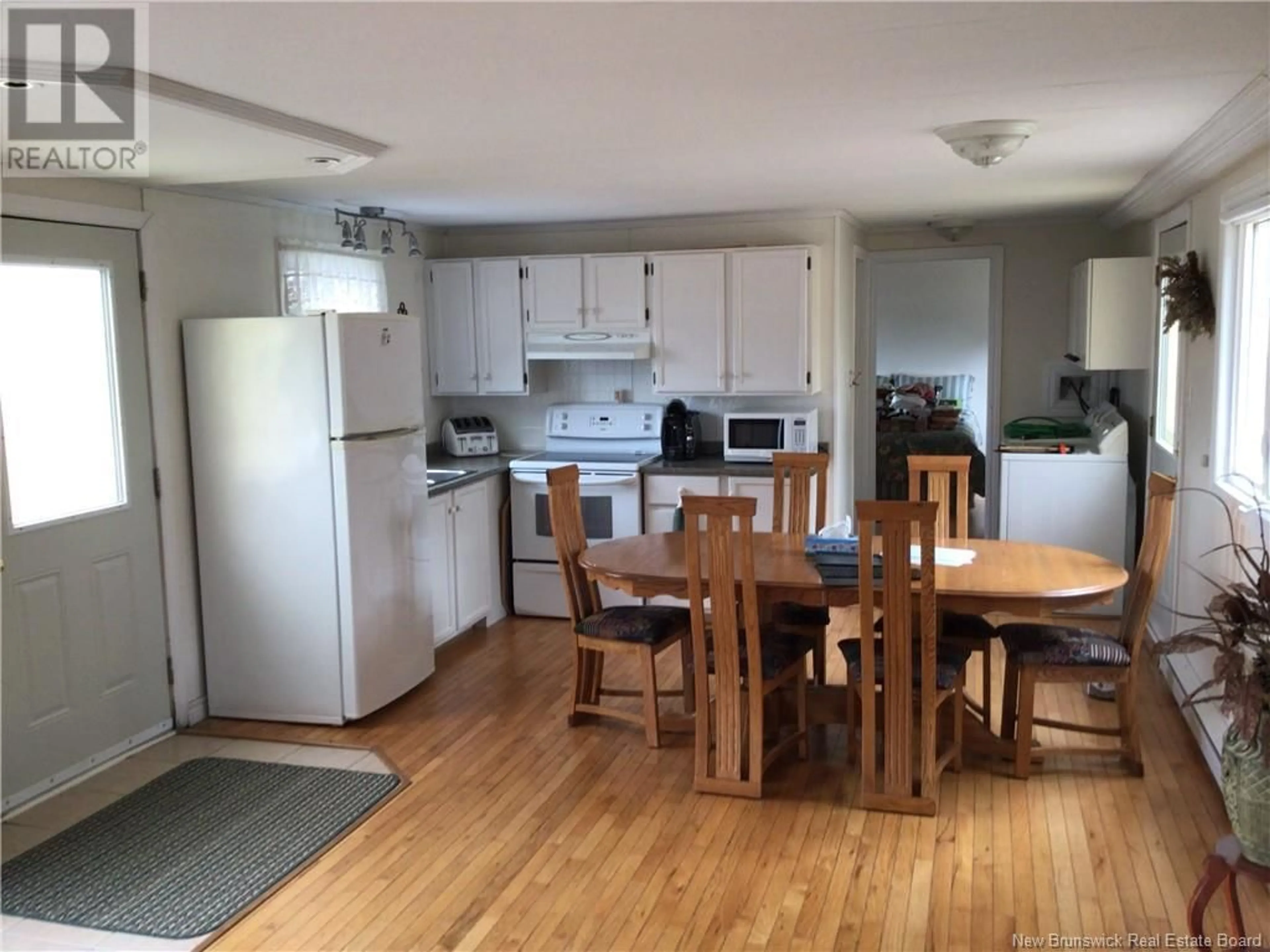 Open concept kitchen, wood/laminate floor for 471 772 ROUTE, Deer Island New Brunswick E5V1R7