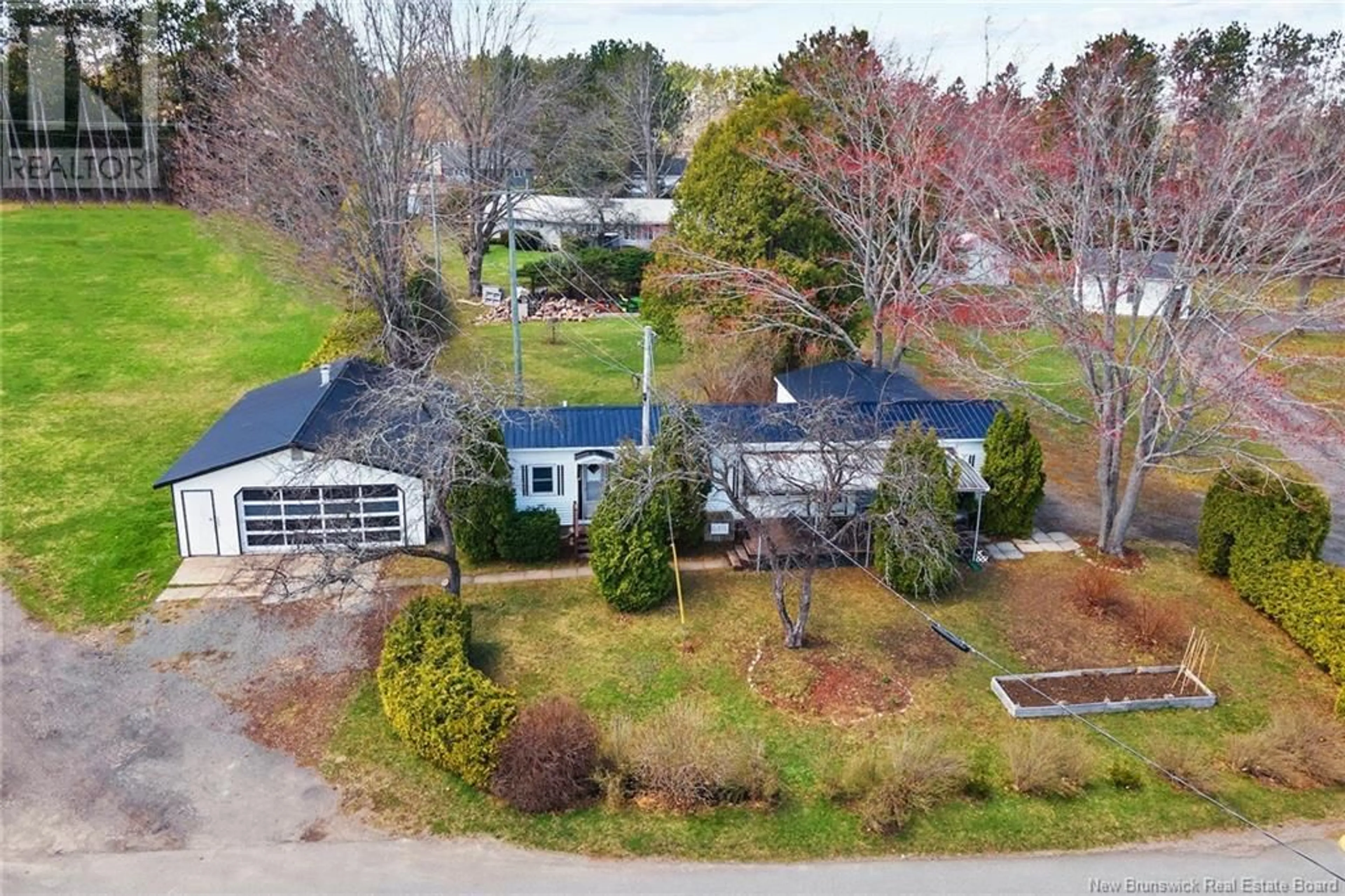 A pic from outside/outdoor area/front of a property/back of a property/a pic from drone, street for 6 KELLY'S DRIVE, Fredericton New Brunswick E3B7R2