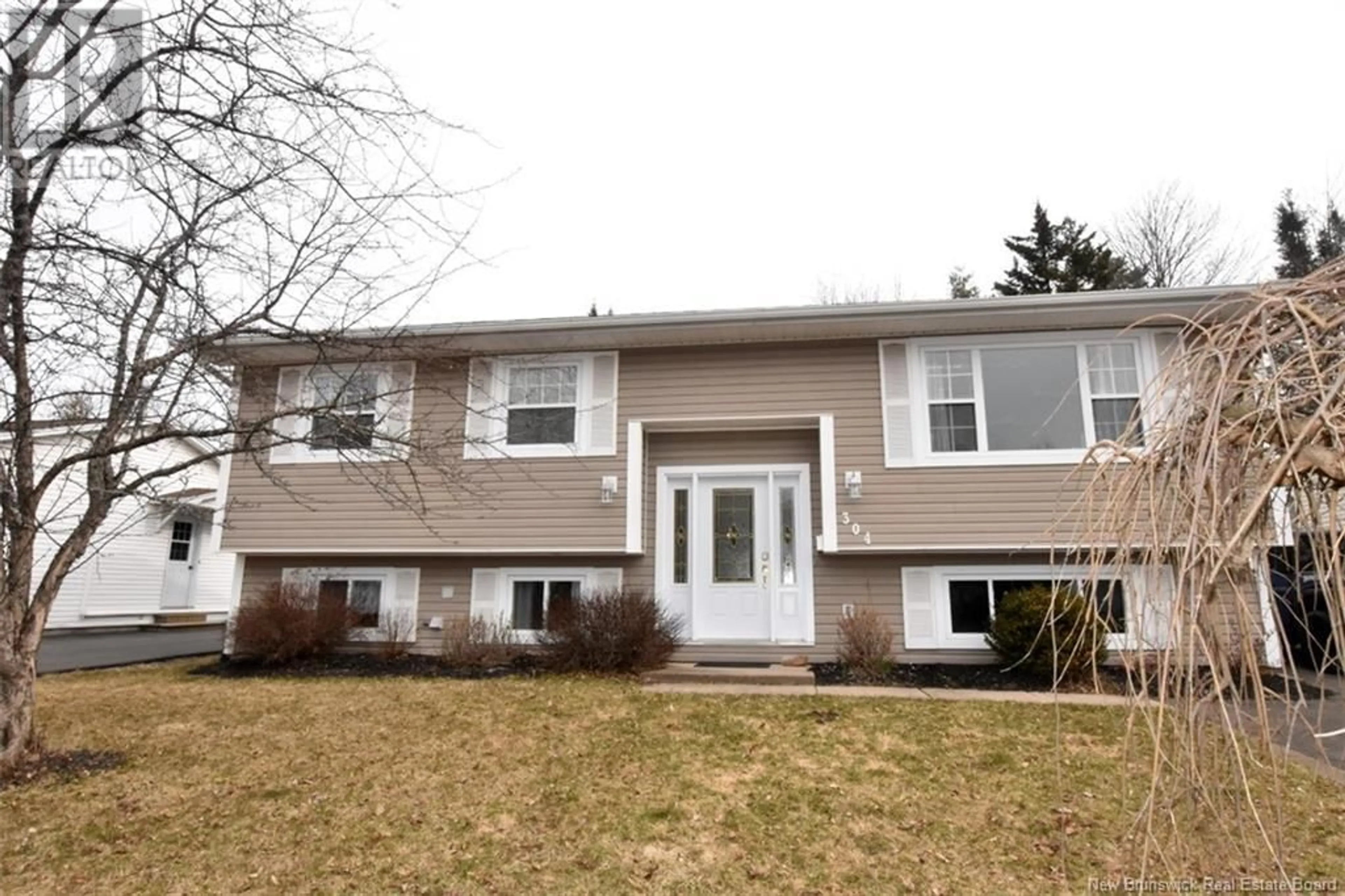 Home with vinyl exterior material, street for 304 CROCKET STREET, Marysville New Brunswick E3A5P6