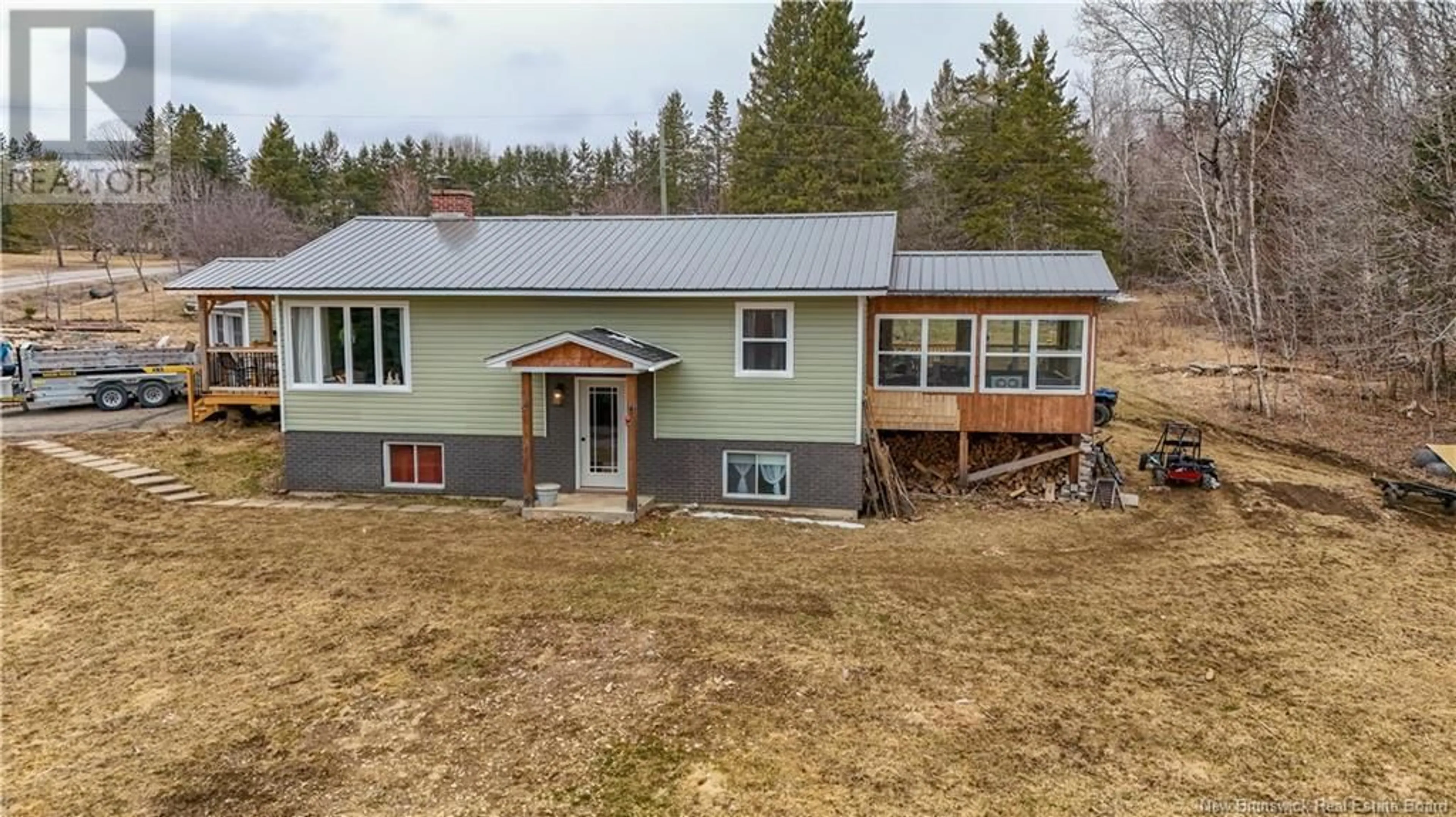 A pic from outside/outdoor area/front of a property/back of a property/a pic from drone, building for 150 LOWER STONERIDGE ROAD, Burtts Corner New Brunswick E6L2P5