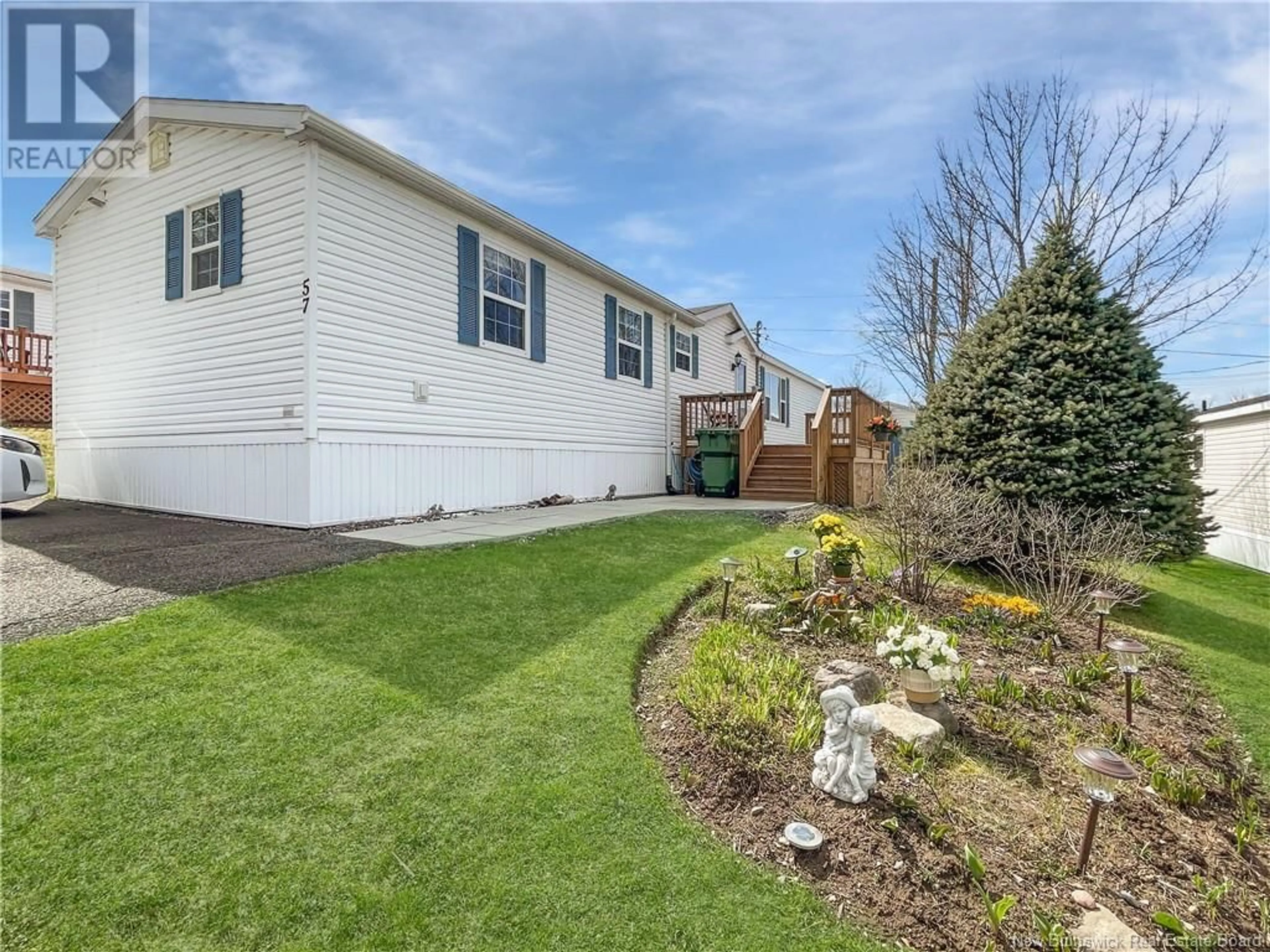 Home with vinyl exterior material, street for 57 MACINTOSH STREET, Fredericton New Brunswick E3C2M9