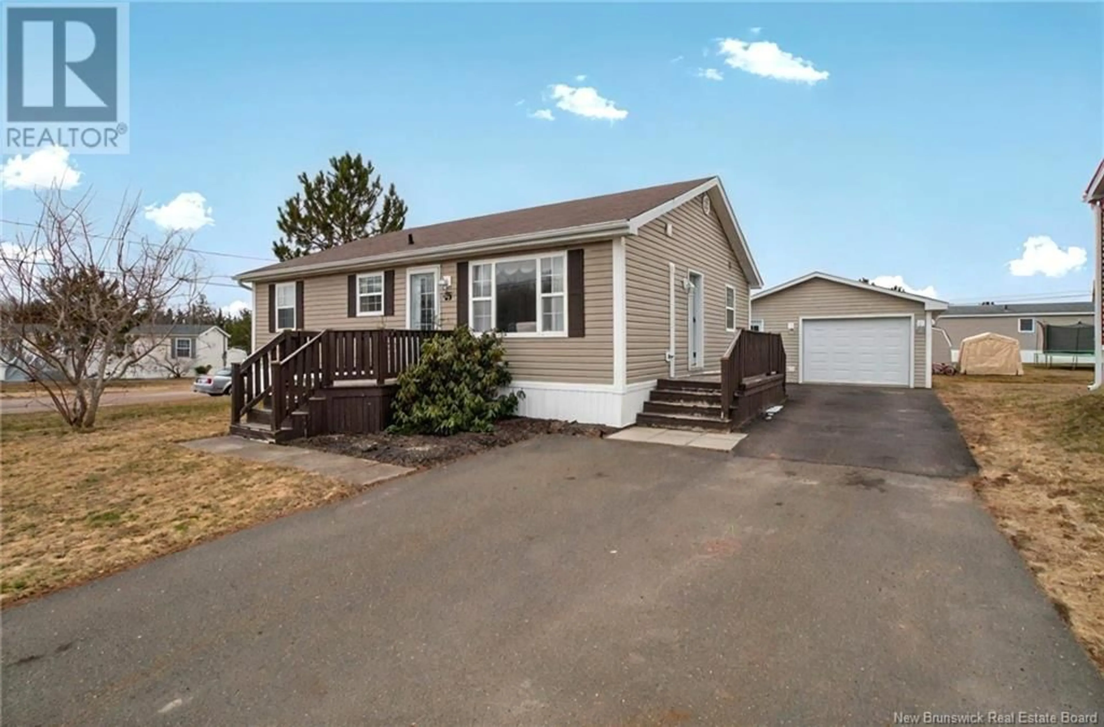 Home with vinyl exterior material, street for 35 SHOPIE DRIVE, Dieppe New Brunswick E1A7C8
