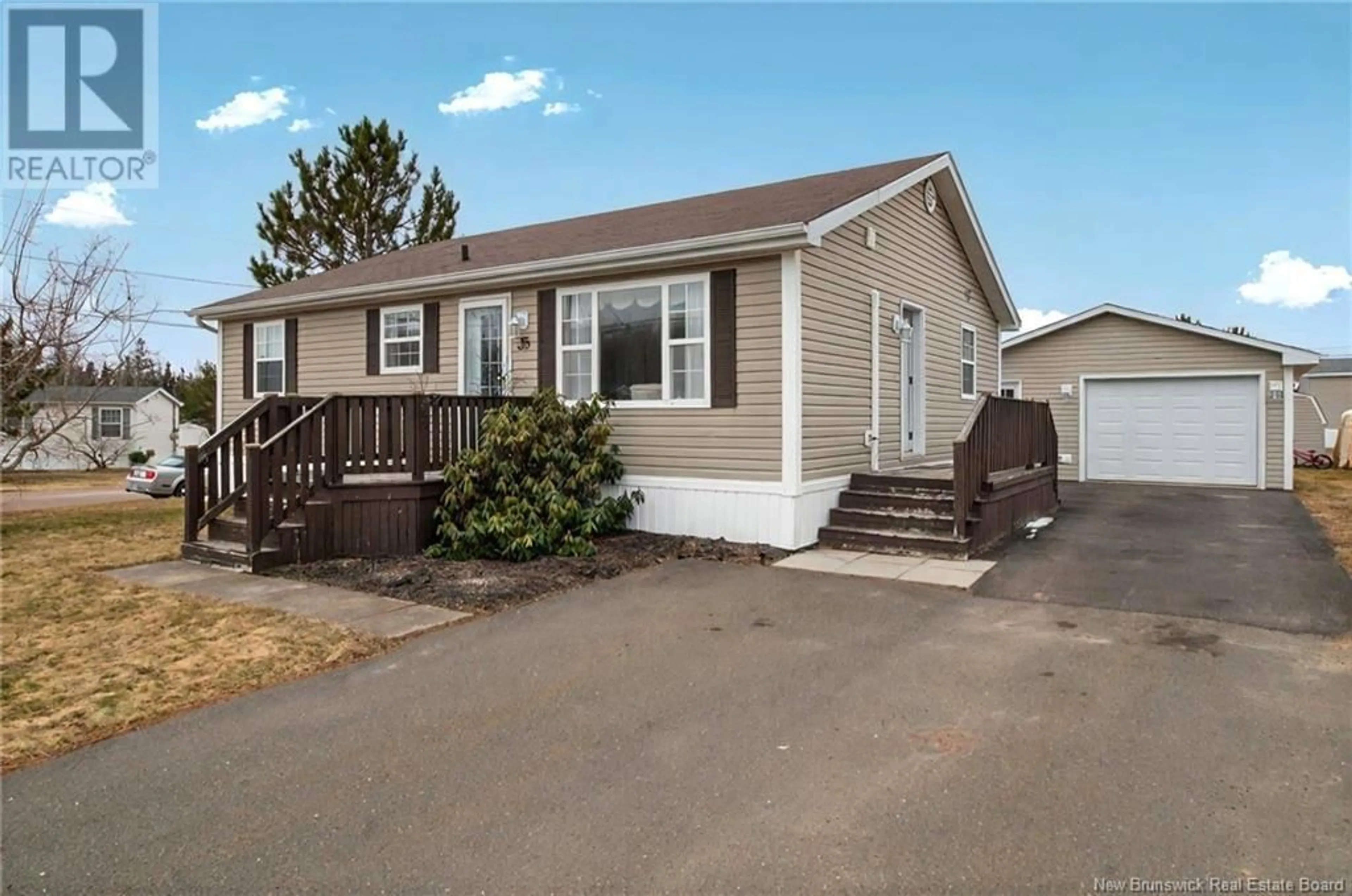 Home with vinyl exterior material, street for 35 SHOPIE DRIVE, Dieppe New Brunswick E1A7C8
