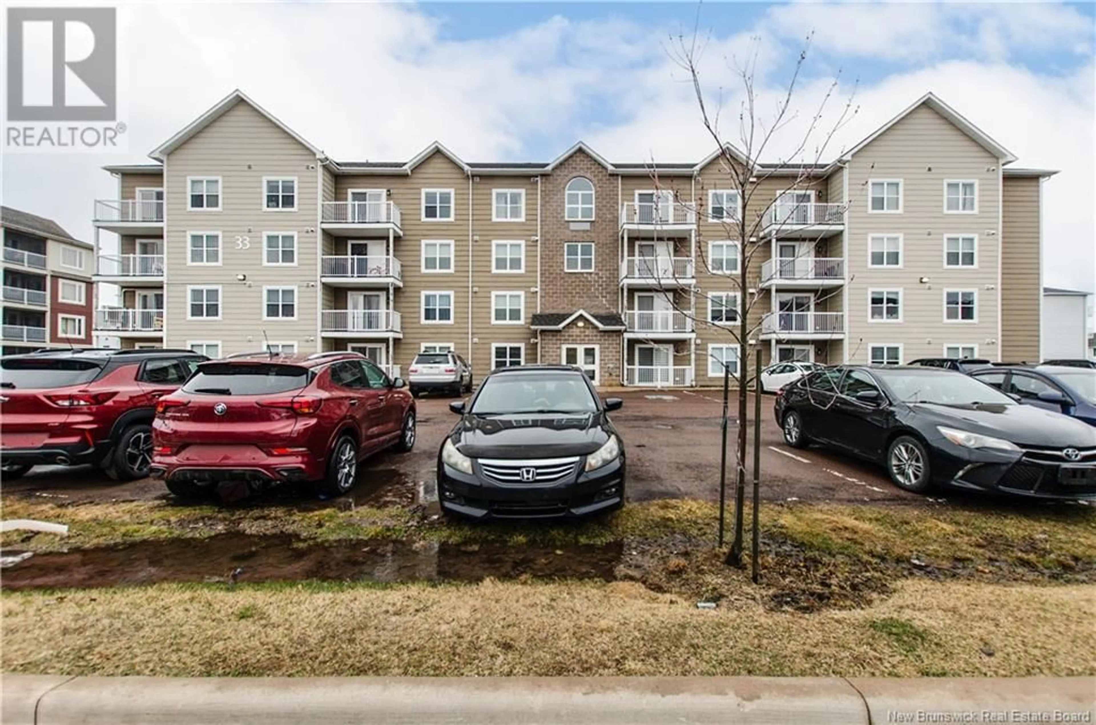 A pic from outside/outdoor area/front of a property/back of a property/a pic from drone, unknown for 207 - 33 SIFROI, Dieppe New Brunswick E1A1L6
