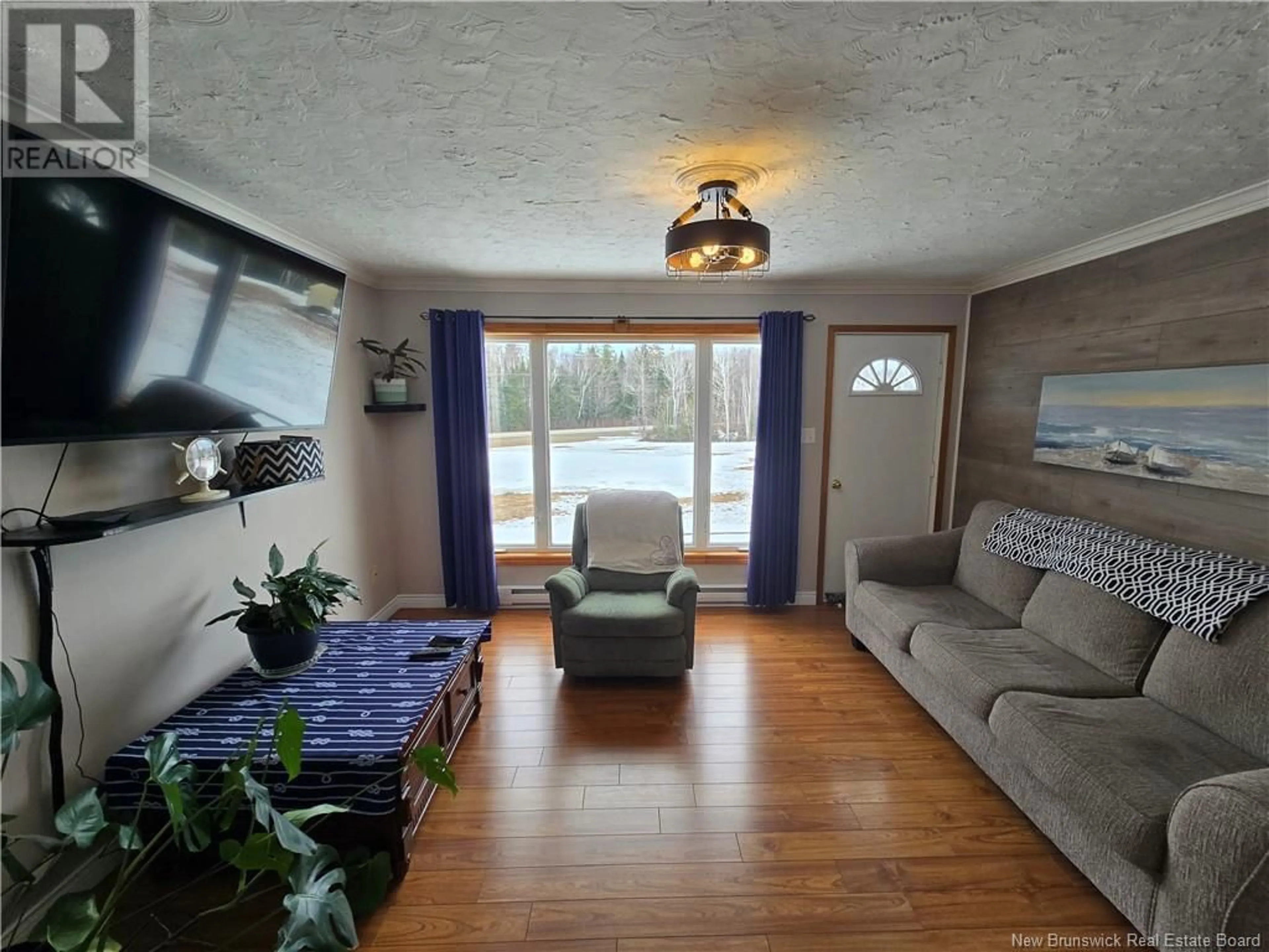 Living room with furniture, wood/laminate floor for 3559 ROUTE 180, South Tetagouche New Brunswick E2A7C7