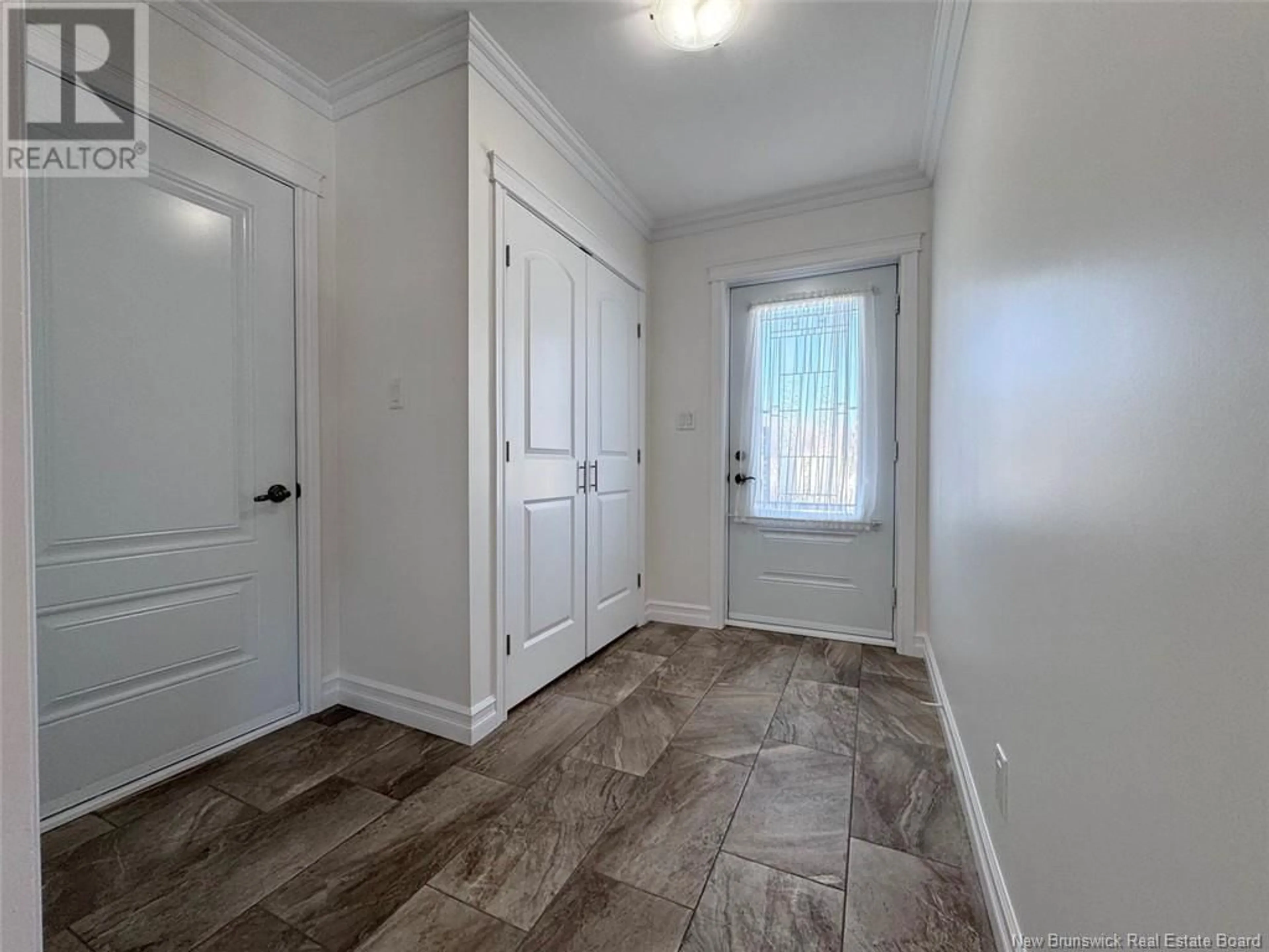 Indoor entryway for 82 BEAULIEU STREET, Saint-Quentin New Brunswick E8A1B2