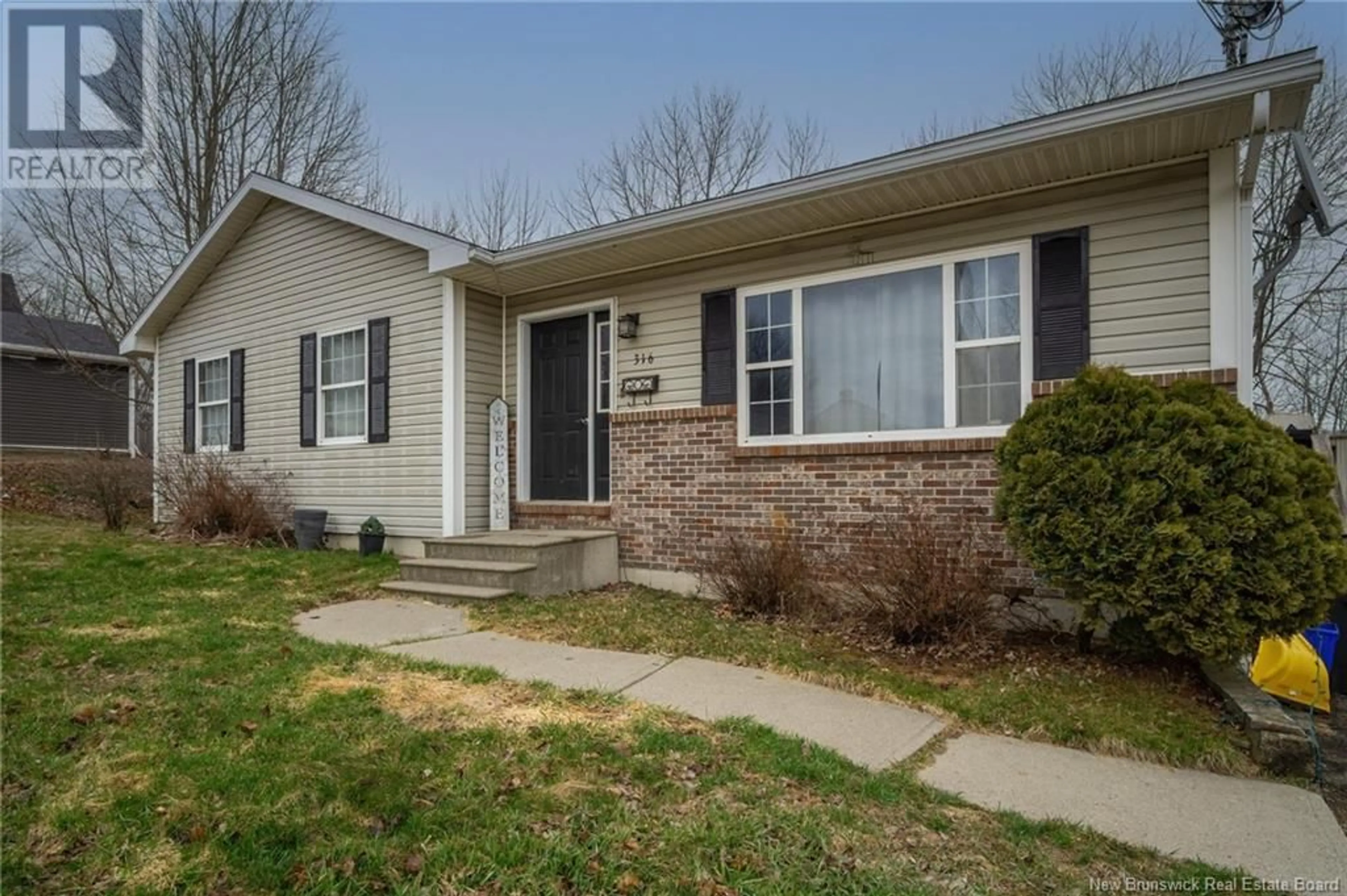 Home with vinyl exterior material, street for 316 MILLTOWN BOULEVARD, St. Stephen New Brunswick E3L1H9