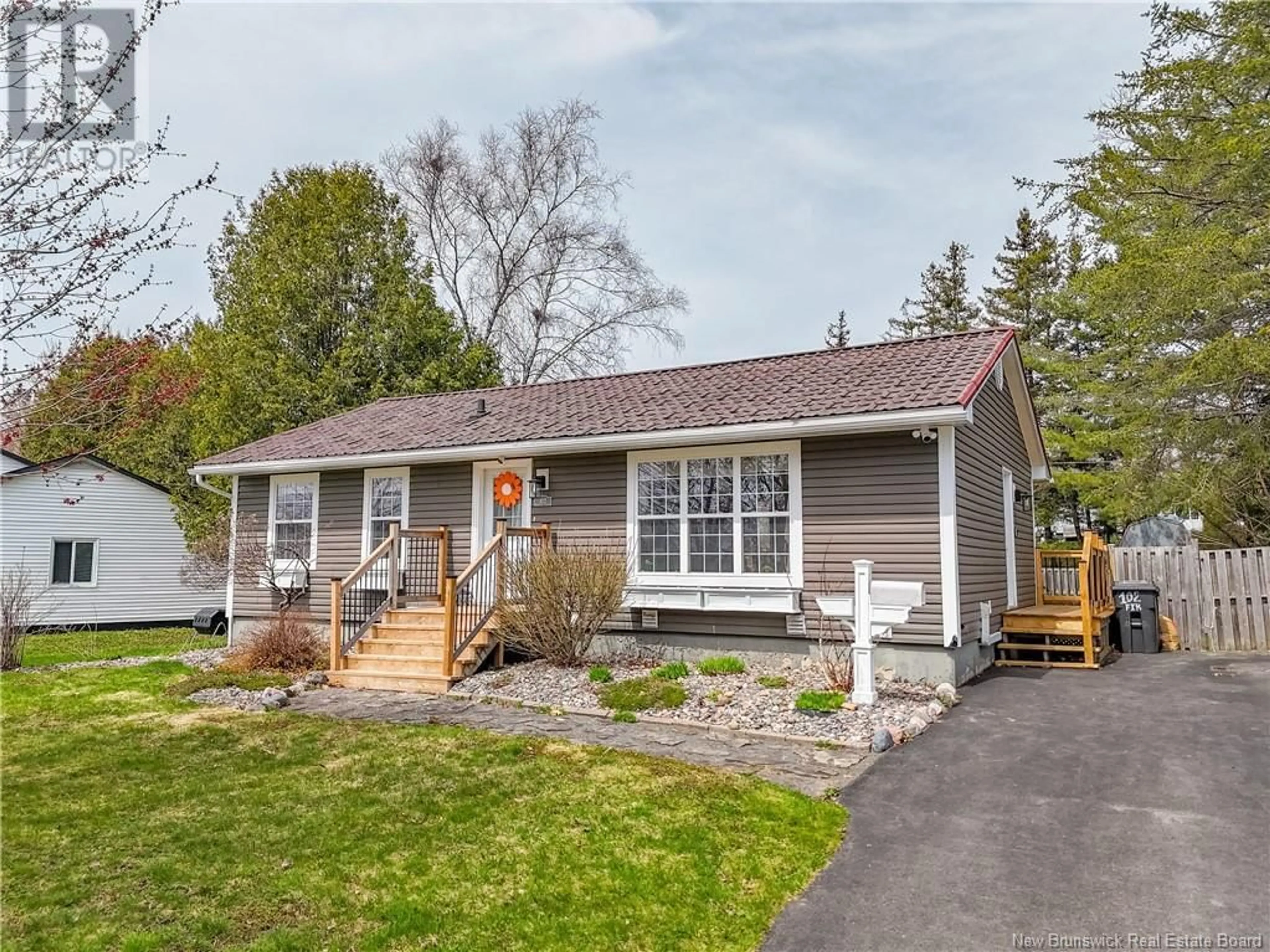 Home with vinyl exterior material, street for 102 FIR COURT, Fredericton New Brunswick E3A2E8