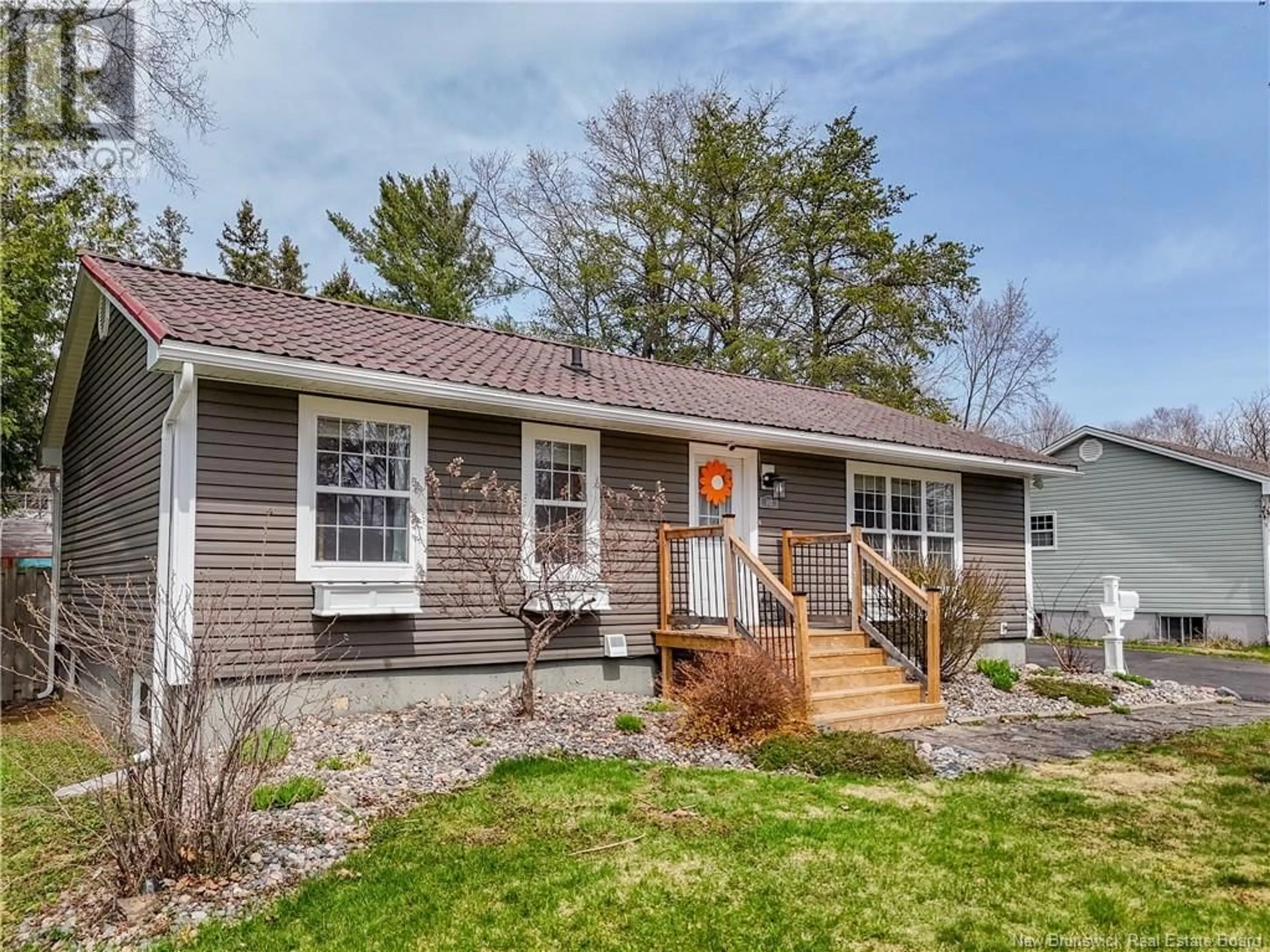 Home with vinyl exterior material, street for 102 FIR COURT, Fredericton New Brunswick E3A2E8