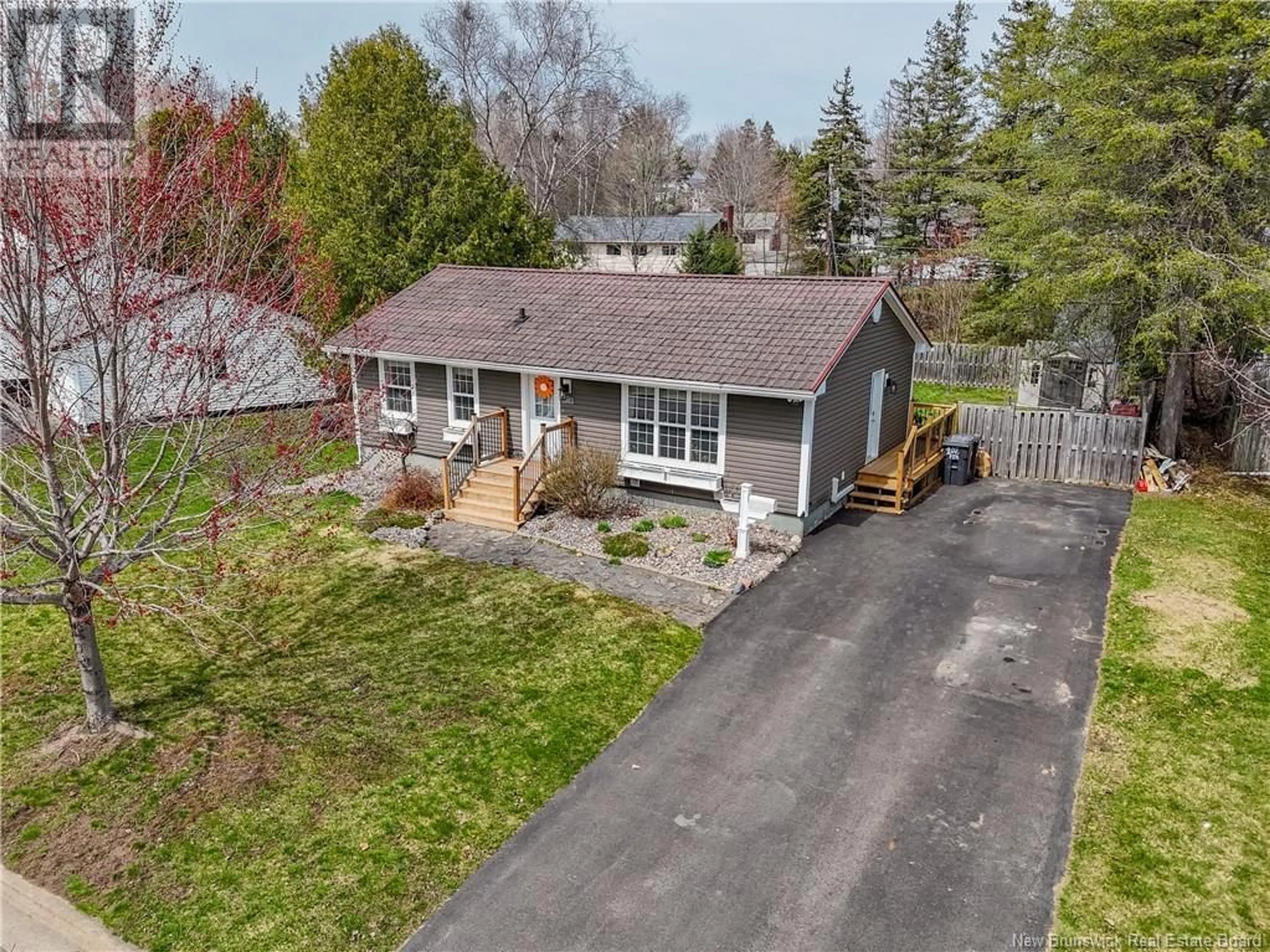 A pic from outside/outdoor area/front of a property/back of a property/a pic from drone, street for 102 FIR COURT, Fredericton New Brunswick E3A2E8