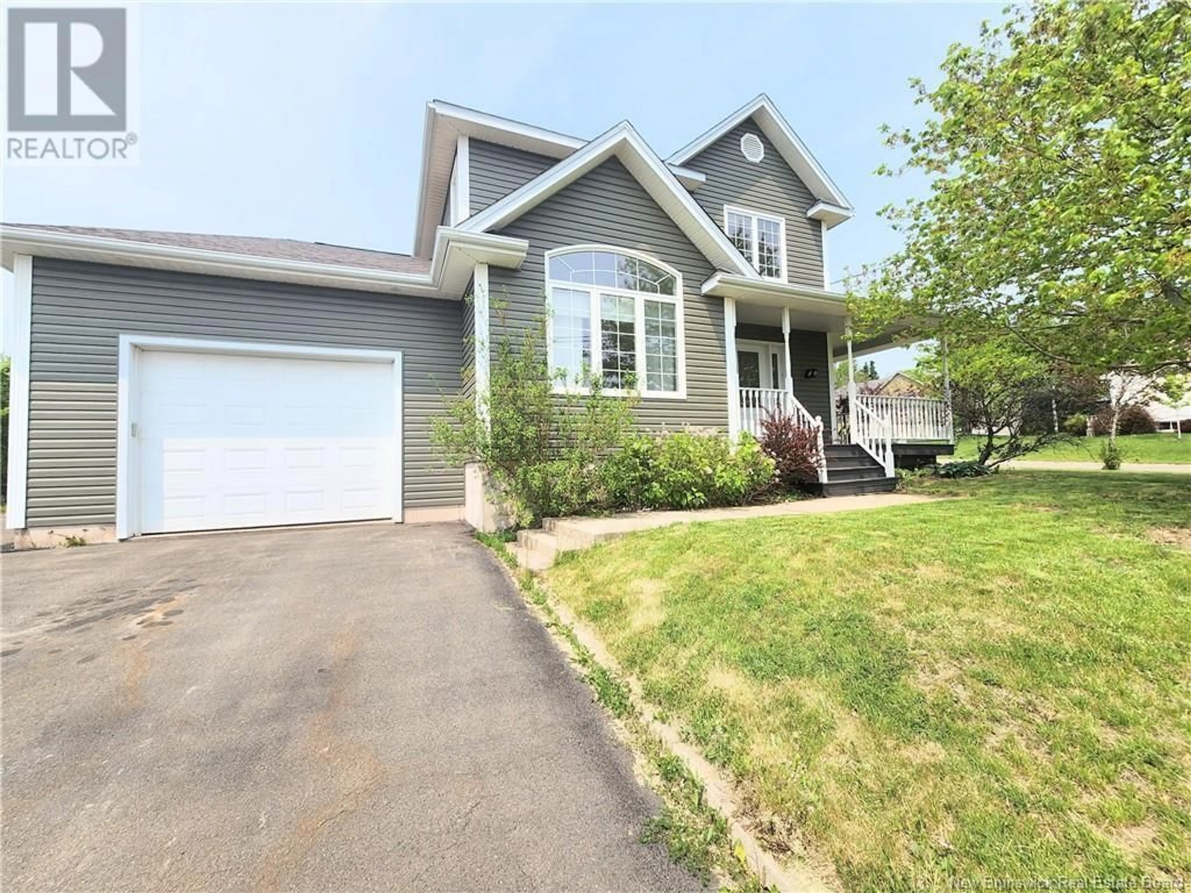 Home with vinyl exterior material, street for 126 MEUNIER STREET, Dieppe New Brunswick E1A7W9
