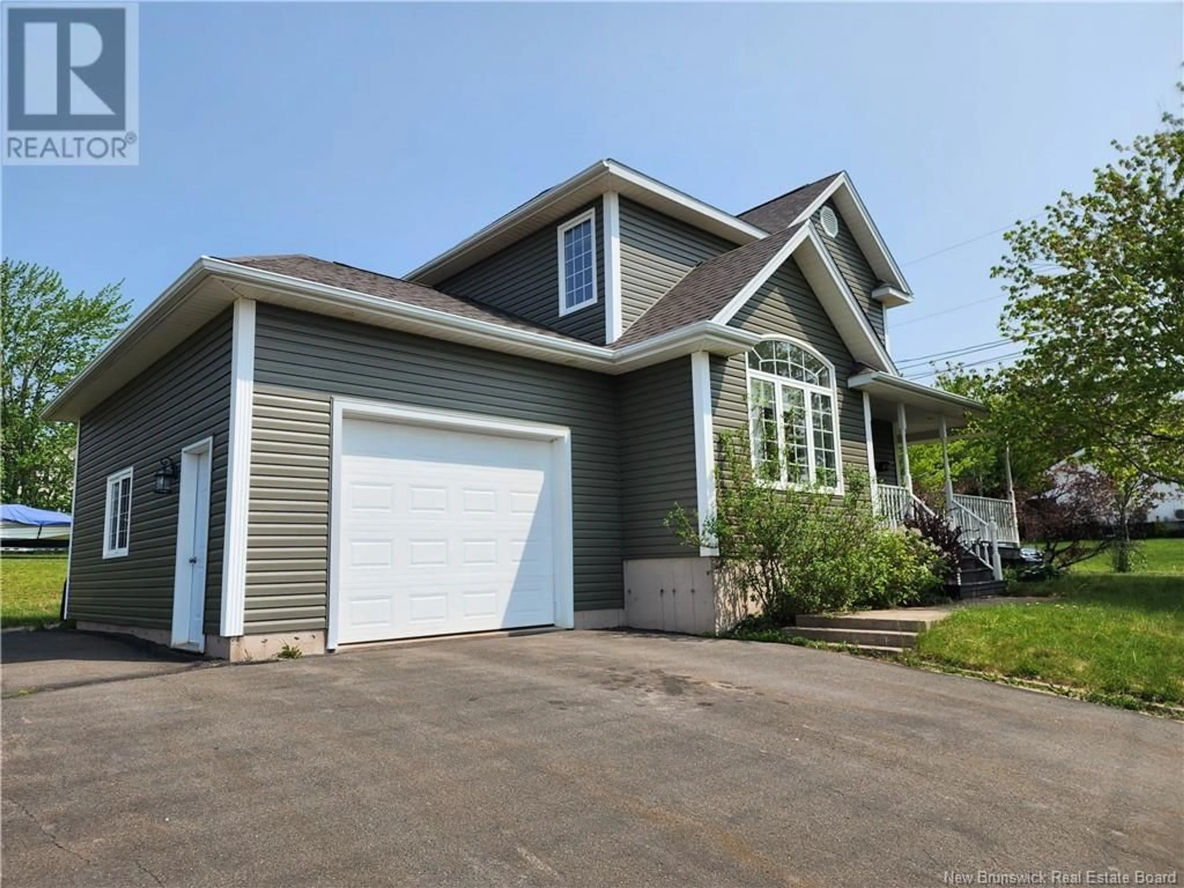 Home with vinyl exterior material, street for 126 MEUNIER STREET, Dieppe New Brunswick E1A7W9