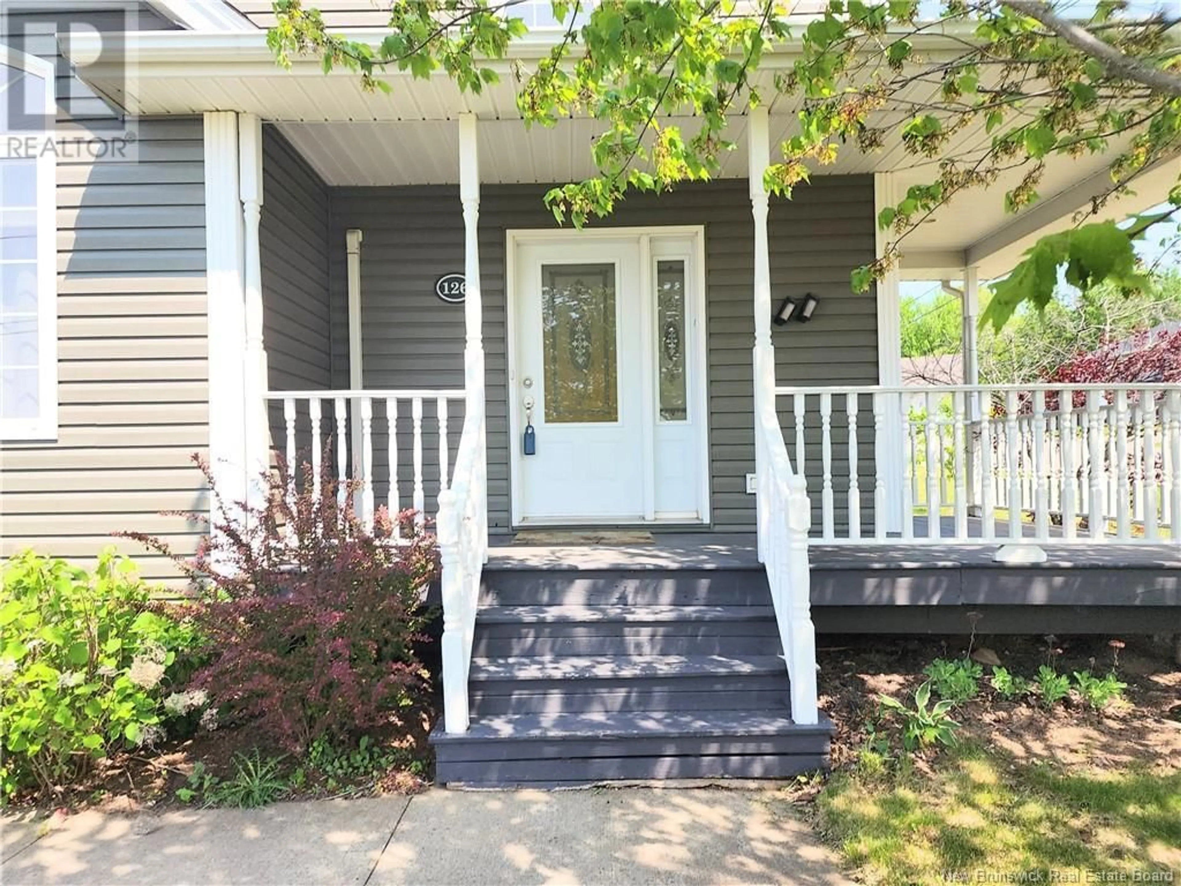 Home with vinyl exterior material, street for 126 MEUNIER STREET, Dieppe New Brunswick E1A7W9