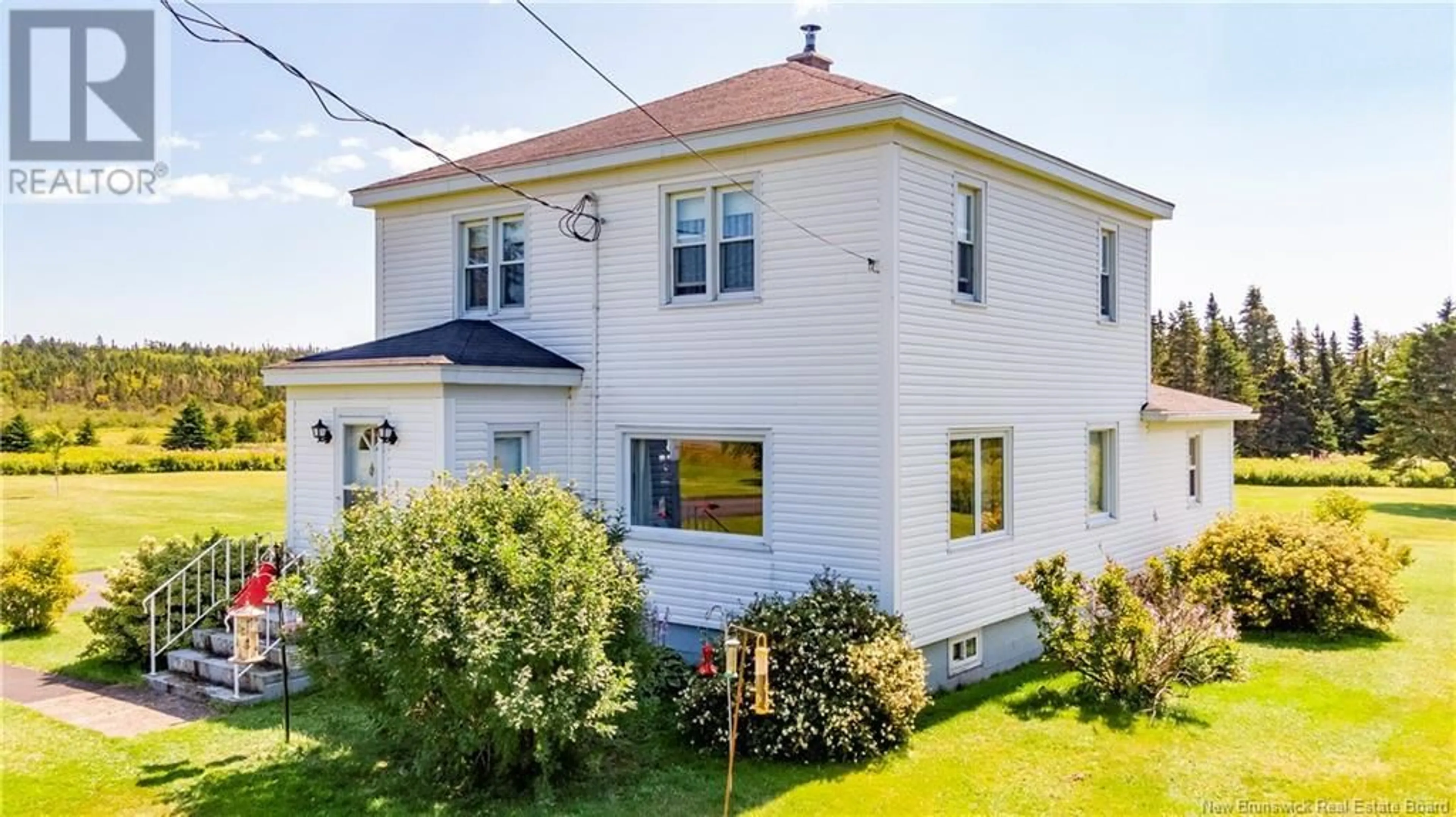 A pic from outside/outdoor area/front of a property/back of a property/a pic from drone, building for 424 MACES BAY ROAD, Maces Bay New Brunswick E5J1T4