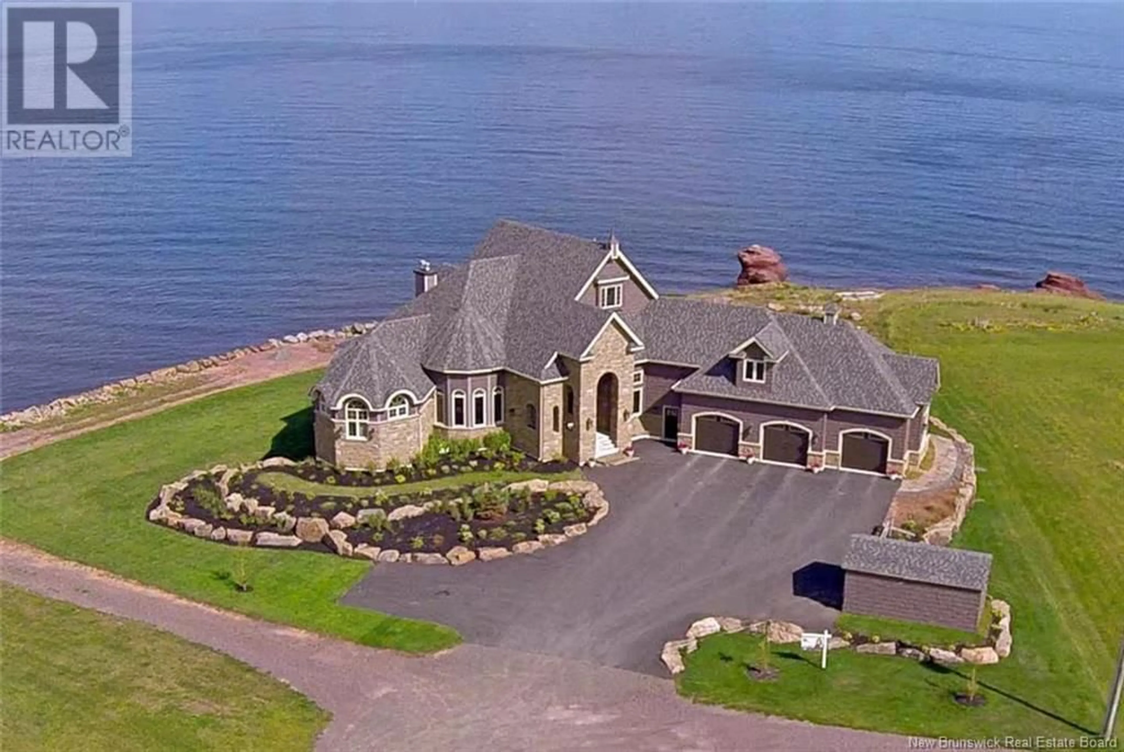A pic from outside/outdoor area/front of a property/back of a property/a pic from drone, water/lake/river/ocean view for 622 JANICE LANE, Cap-Pelé New Brunswick E4N1V6