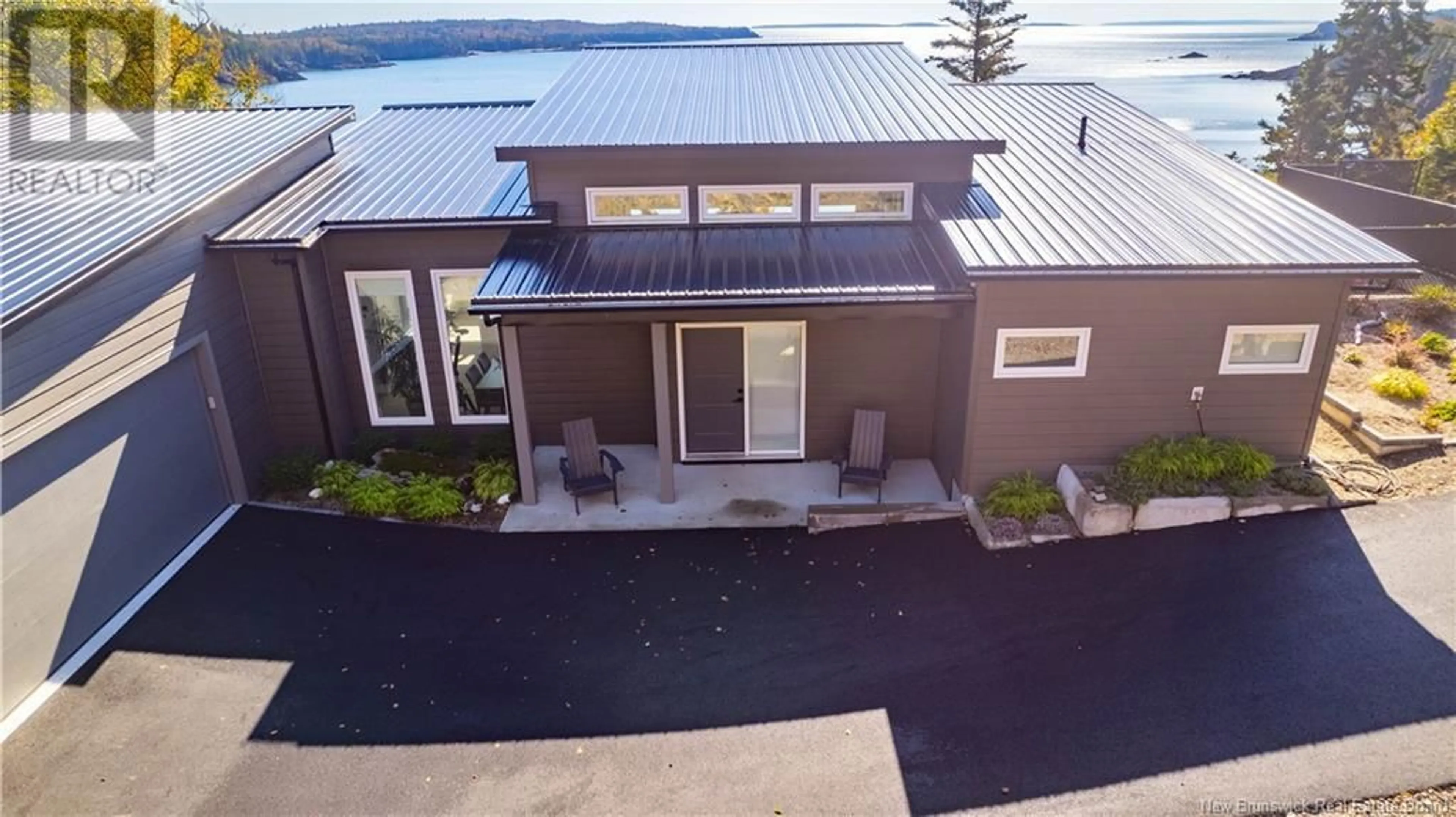 A pic from outside/outdoor area/front of a property/back of a property/a pic from drone, water/lake/river/ocean view for 15-30 WAITES LANE, Beaver Harbour New Brunswick E5C2L3