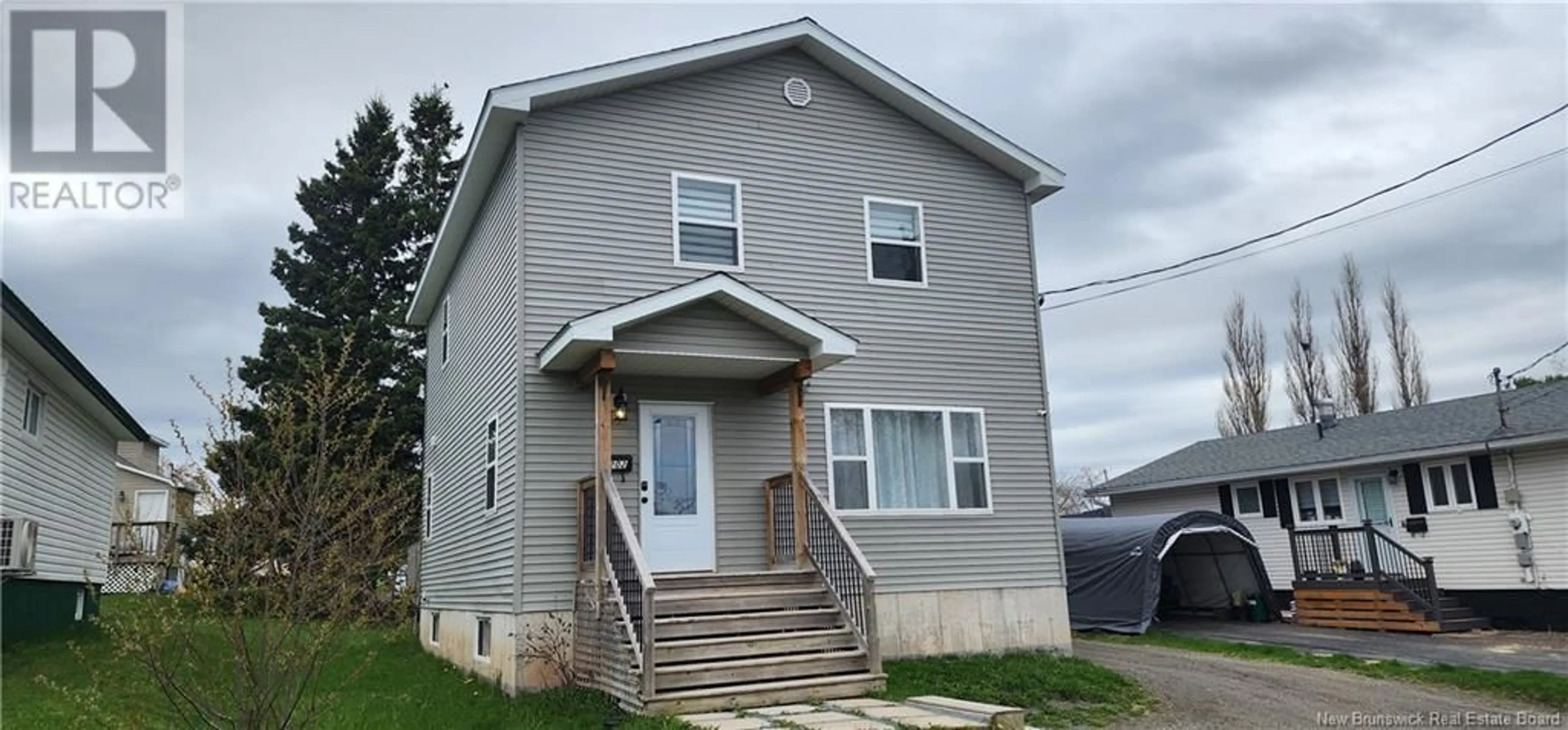 Home with vinyl exterior material, street for 202 CHURCHILL, Moncton New Brunswick E1C7J9