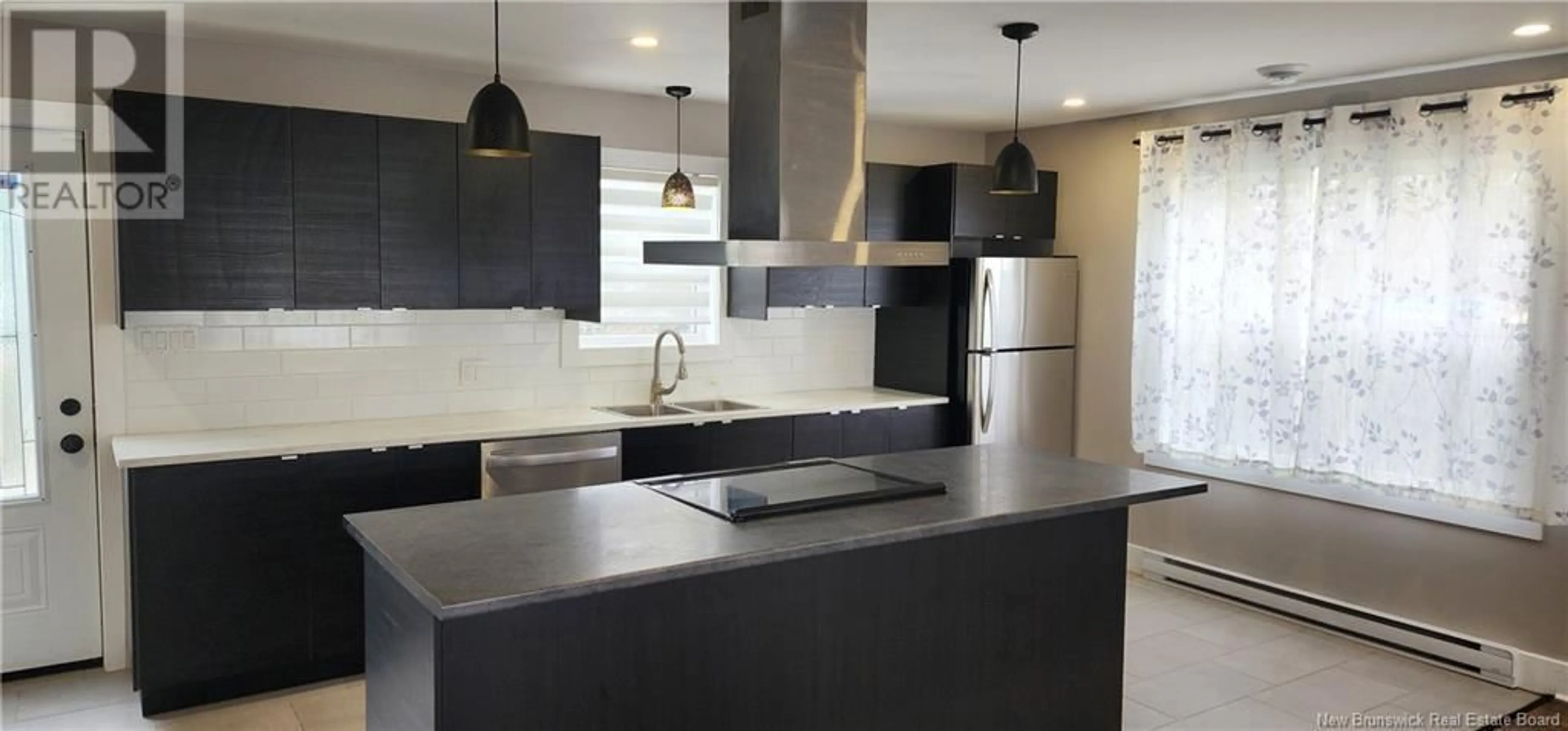 Open concept kitchen, ceramic/tile floor for 202 CHURCHILL, Moncton New Brunswick E1C7J9