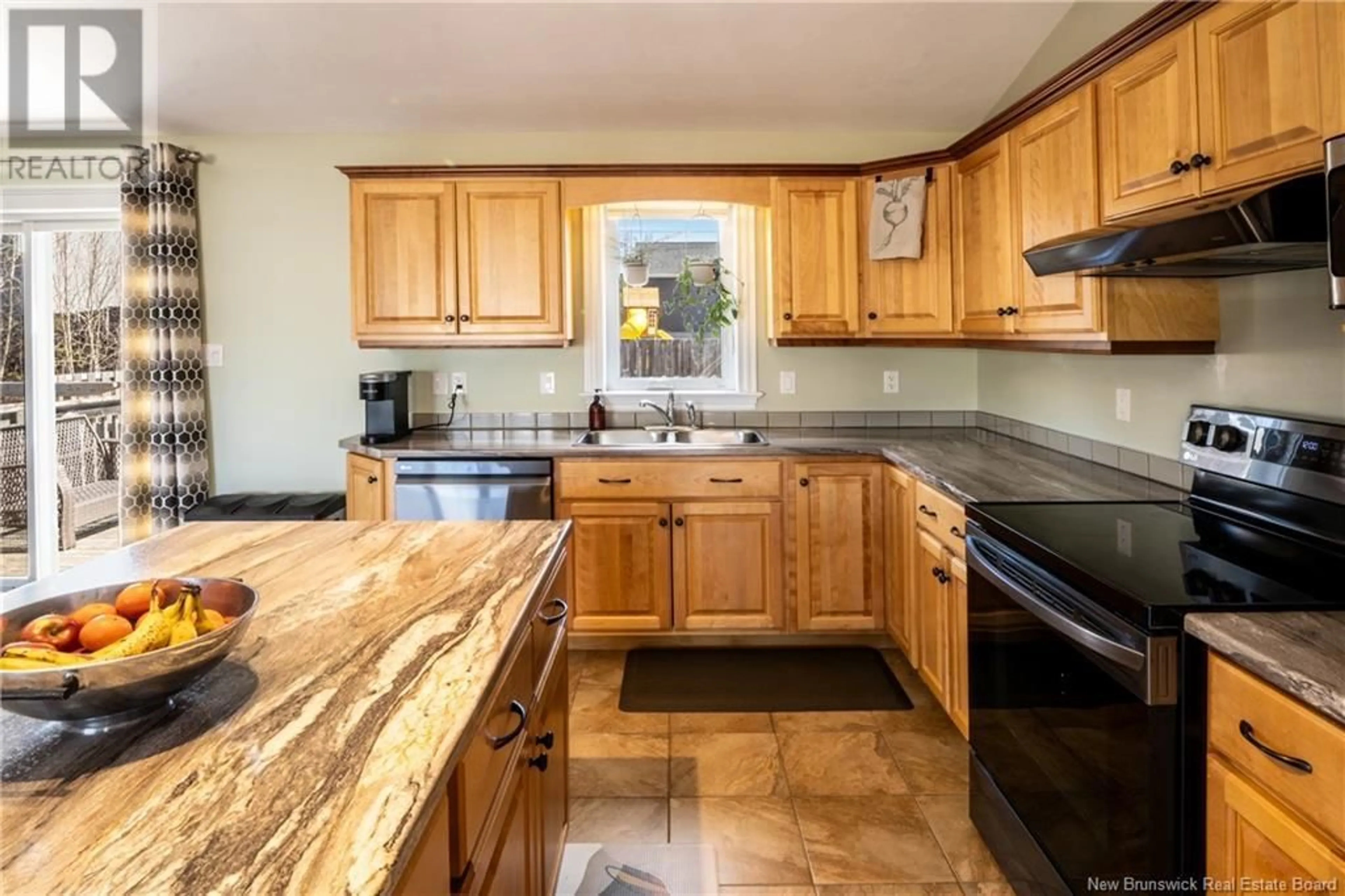 Standard kitchen, ceramic/tile floor for 39 MONIQUE STREET, Moncton New Brunswick E1G0R3