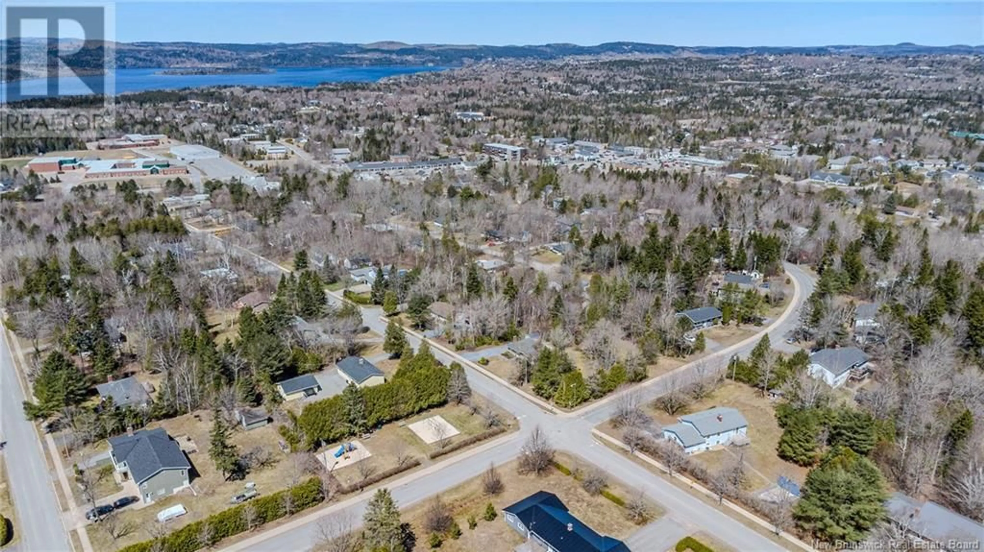 A pic from outside/outdoor area/front of a property/back of a property/a pic from drone, water/lake/river/ocean view for 18 HIGHLAND AVENUE, Rothesay New Brunswick E2E5M8